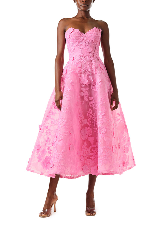 Monique Lhuillier Fall 2024 tea-length, strapless dress in pink 3D lace with full skirt and fitted sweetheart bodice - front.