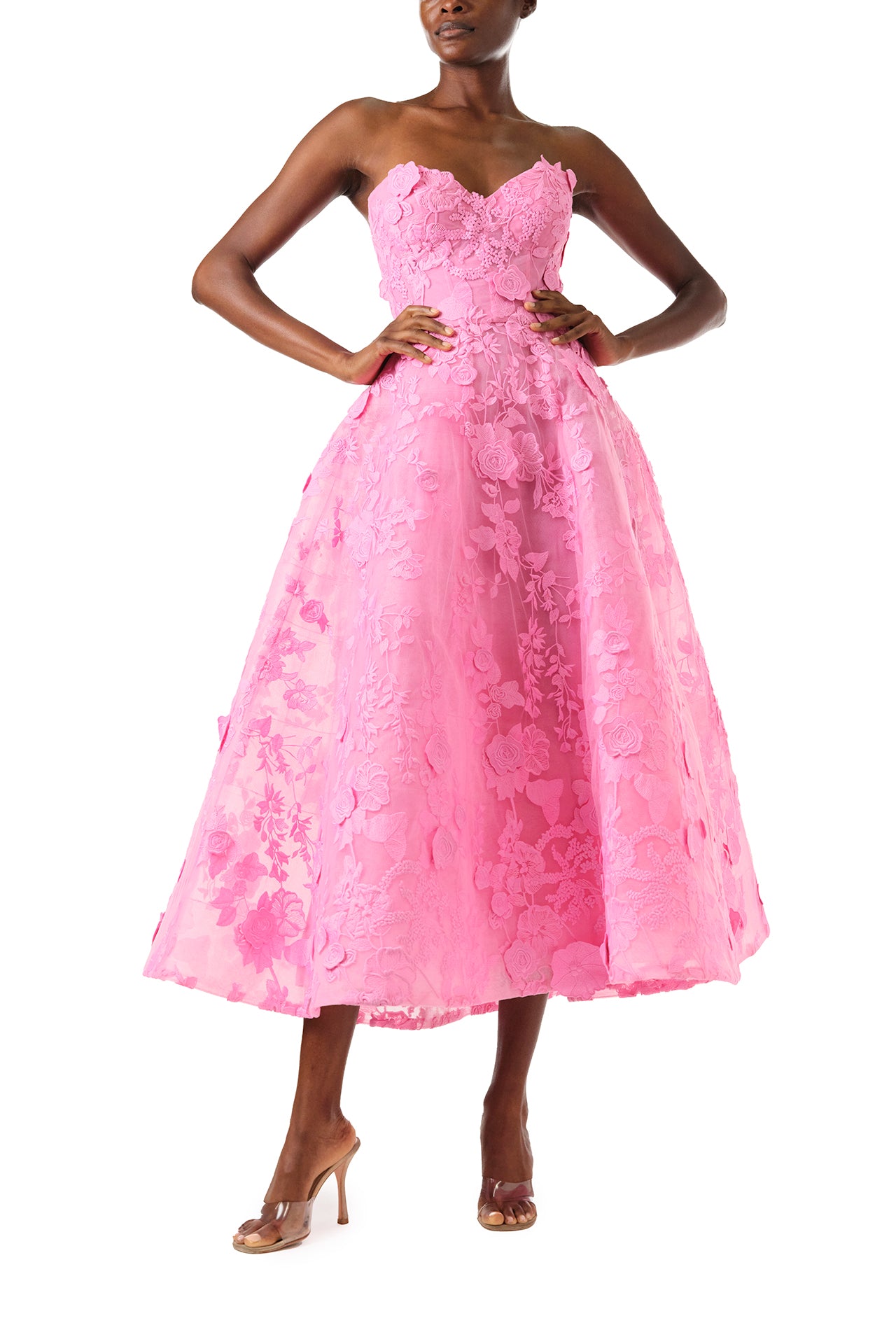 Monique Lhuillier Fall 2024 tea-length, strapless dress in pink 3D lace with full skirt and fitted sweetheart bodice - front two.