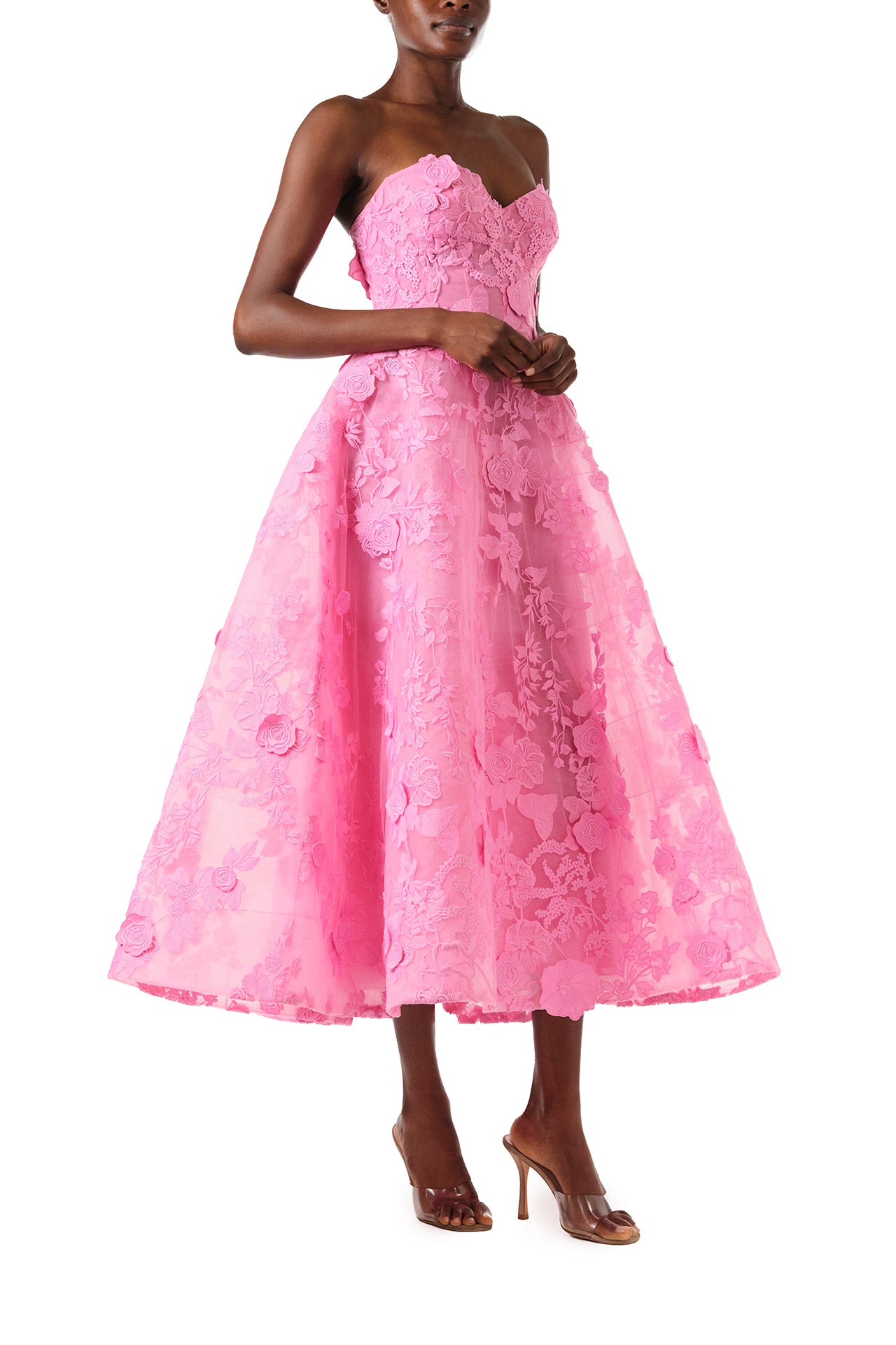 Monique Lhuillier Fall 2024 tea-length, strapless dress in pink 3D lace with full skirt and fitted sweetheart bodice - right side.