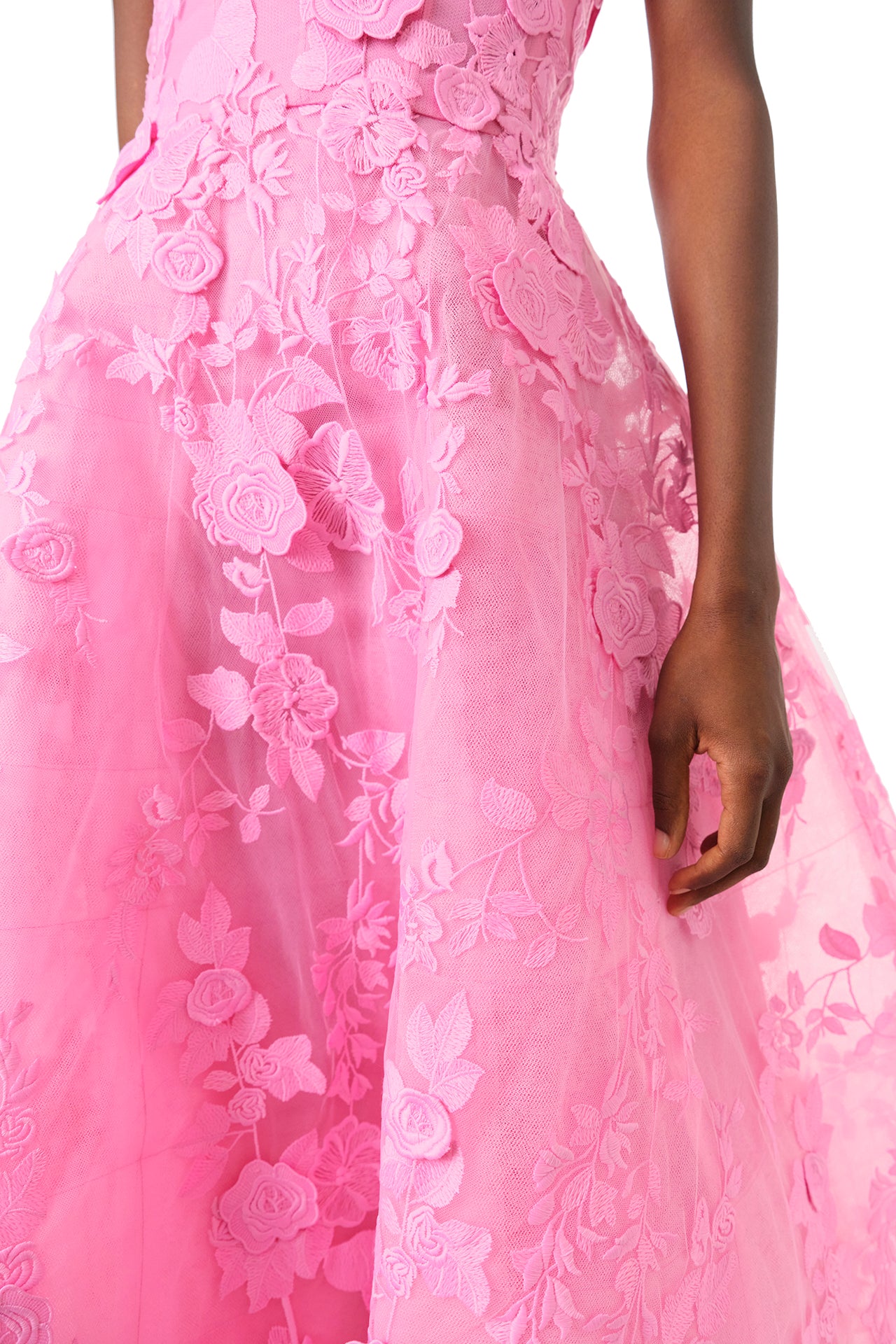 Monique Lhuillier Fall 2024 tea-length, strapless dress in pink 3D lace with full skirt and fitted sweetheart bodice - fabric detail.