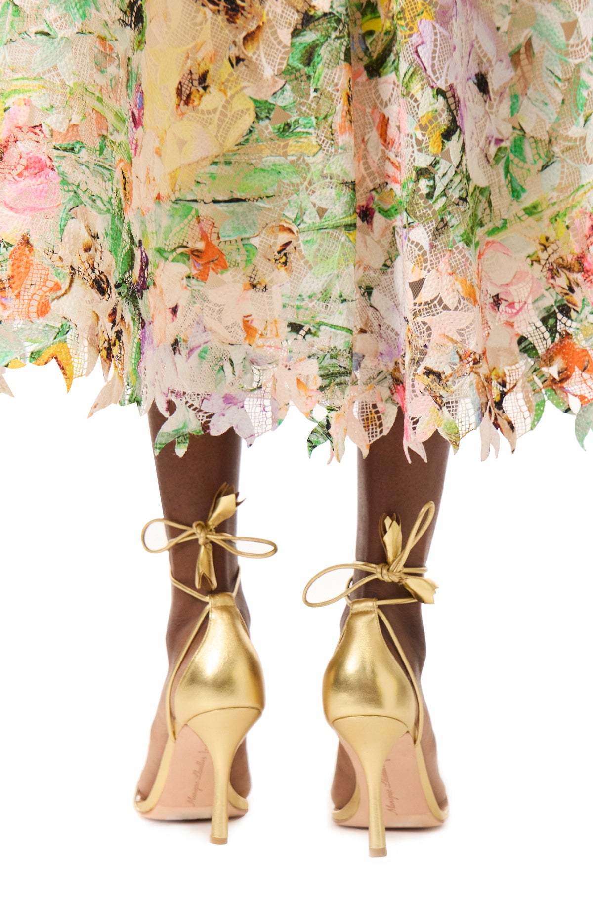 Monique Lhuillier gold leather heel with ankle ties.