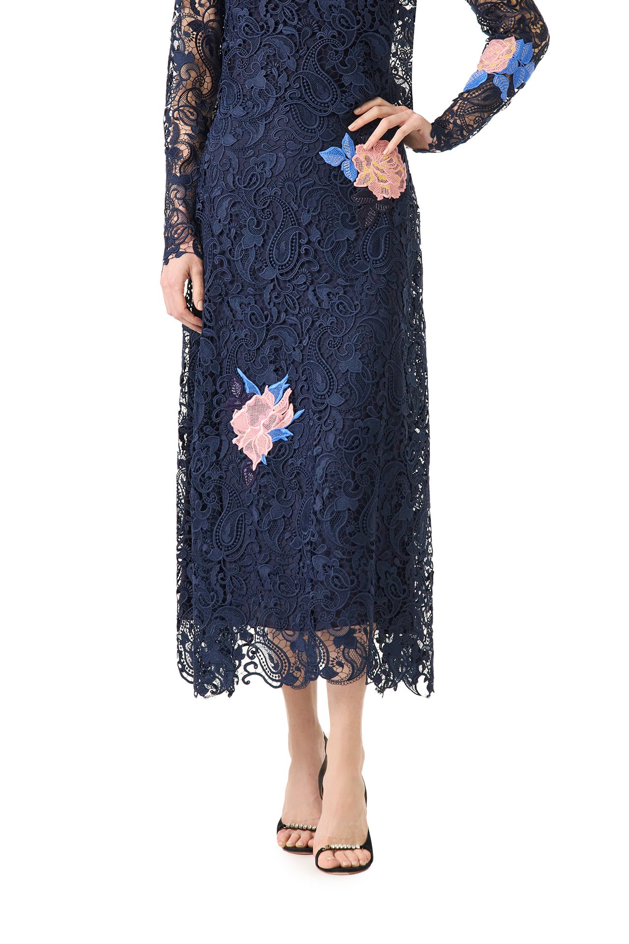 Monique Lhuillier midi-length navy guipure lace skirt with pink lace flowers - front.