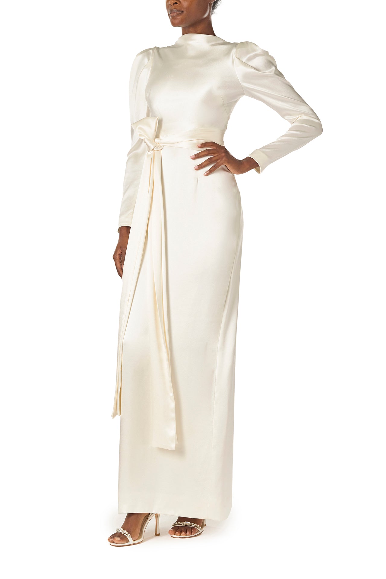 Monique Lhuillier Fall 2024 Long sleeve silk white satin gown with Bateau neckline, V-back and detached self-tie sash - left side.