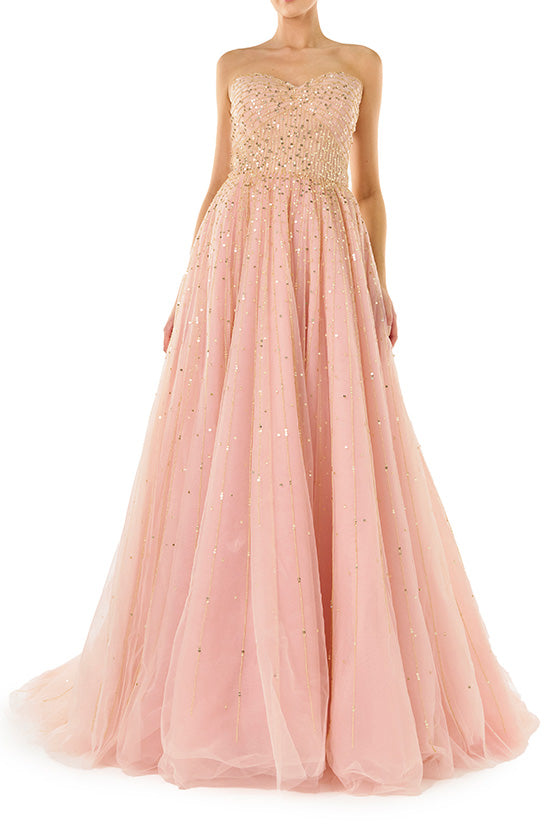 Monique Lhuillier strapless ballgown in rose colored tulle and gold embroidery.