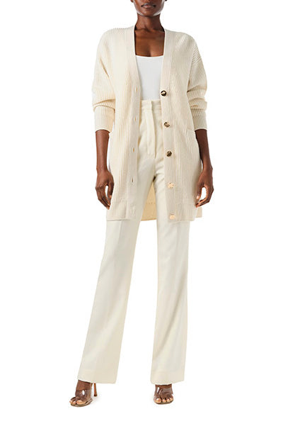 Monique Lhuillier Spring 2024 white cashmere long chunky cardigan with gold buttons - front 2.
