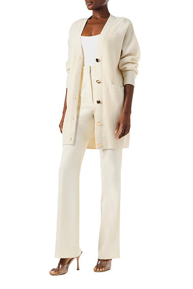 Monique Lhuillier Spring 2024 white cashmere long chunky cardigan with gold buttons - side.
