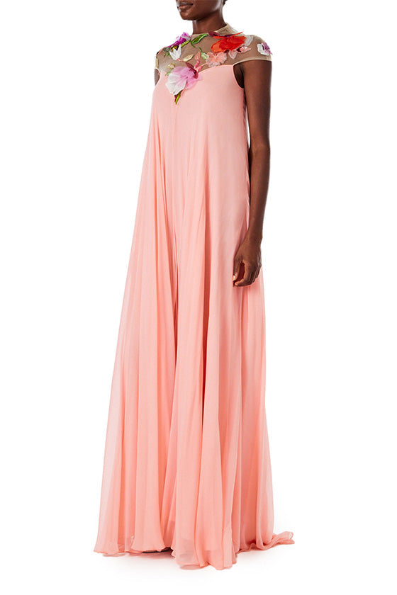 Monique Lhuillier Spring 2024 Melon chiffon caftan gown with floral 3-D embroidery over an illusion tulle neckline - side one.