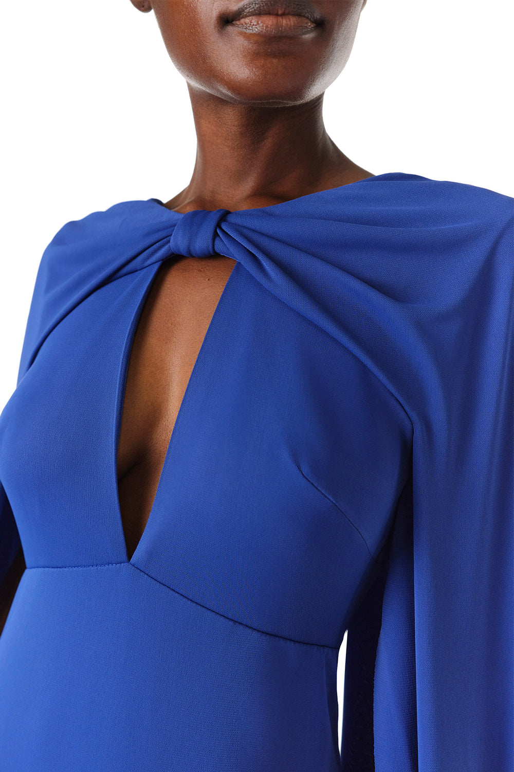 Monique Lhuillier Spring 2024 royal blue crepe-back satin gown with attached cape and keyhole bodice - keyhole detail.