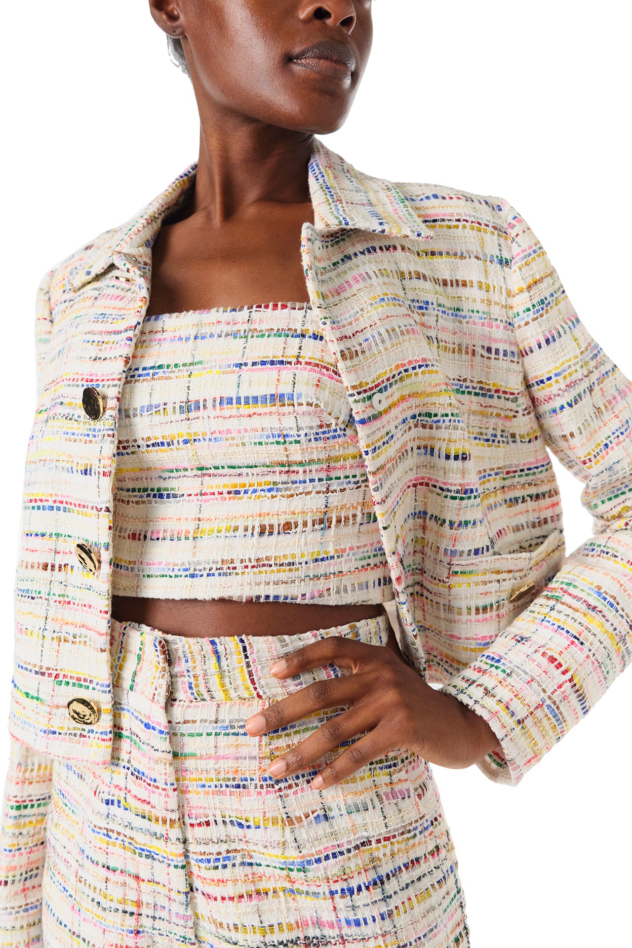 Monique Lhuillier Spring 2024 silk white multi colored tweed cropped jacket shown with high waisted trousers - fabric detail.
