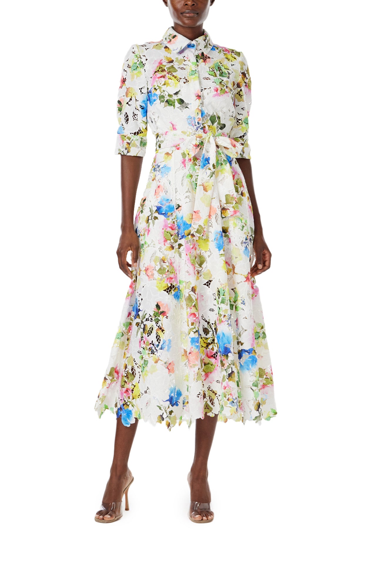 Monique Lhuillier Spring 2024 silk white floral printed lace shirt dress with pockets and a scalloped hem - front.
