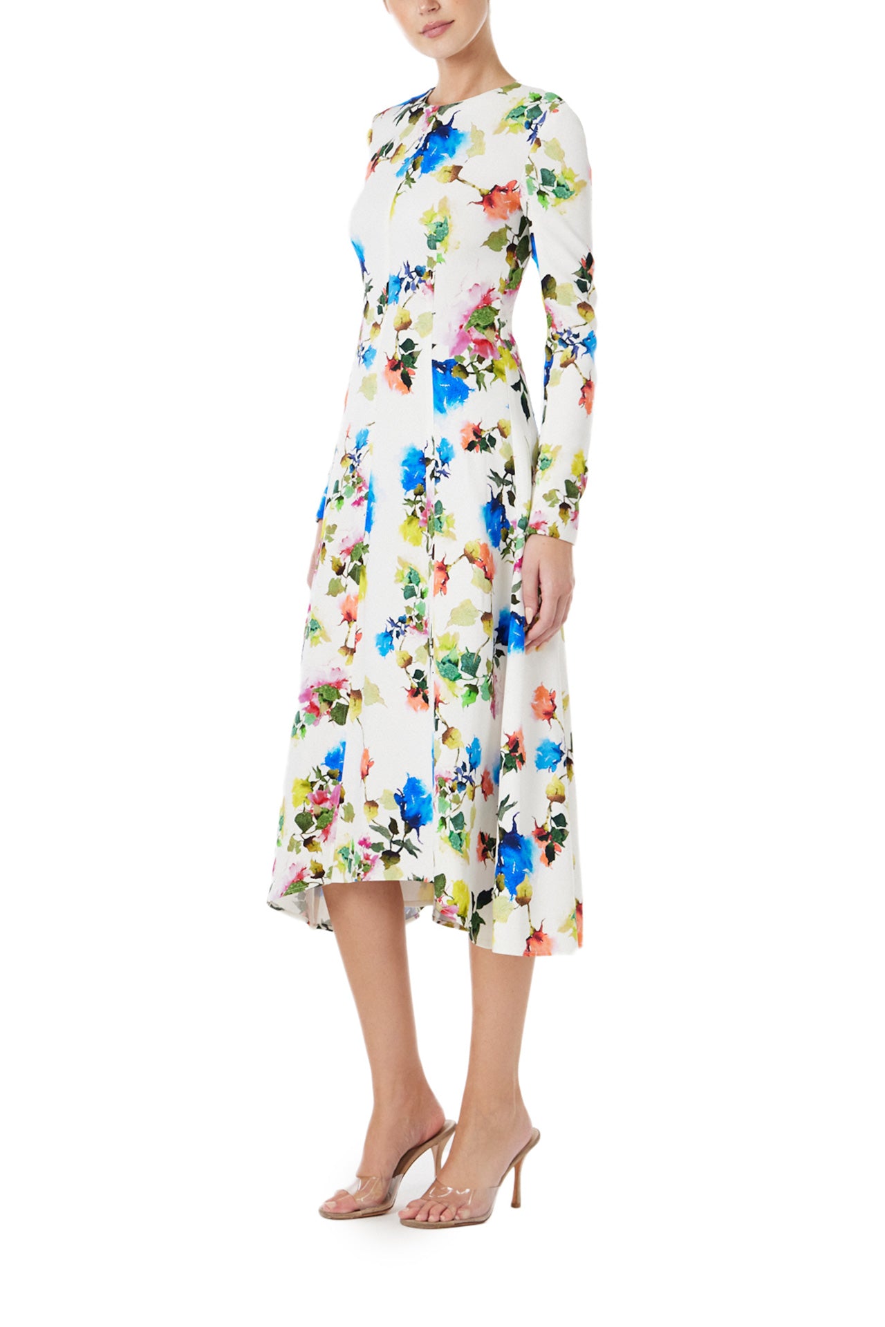 Monique Lhuillier Spring 2024 long sleeve midi dress with jewel neckline in silk white multi floral print - left side.