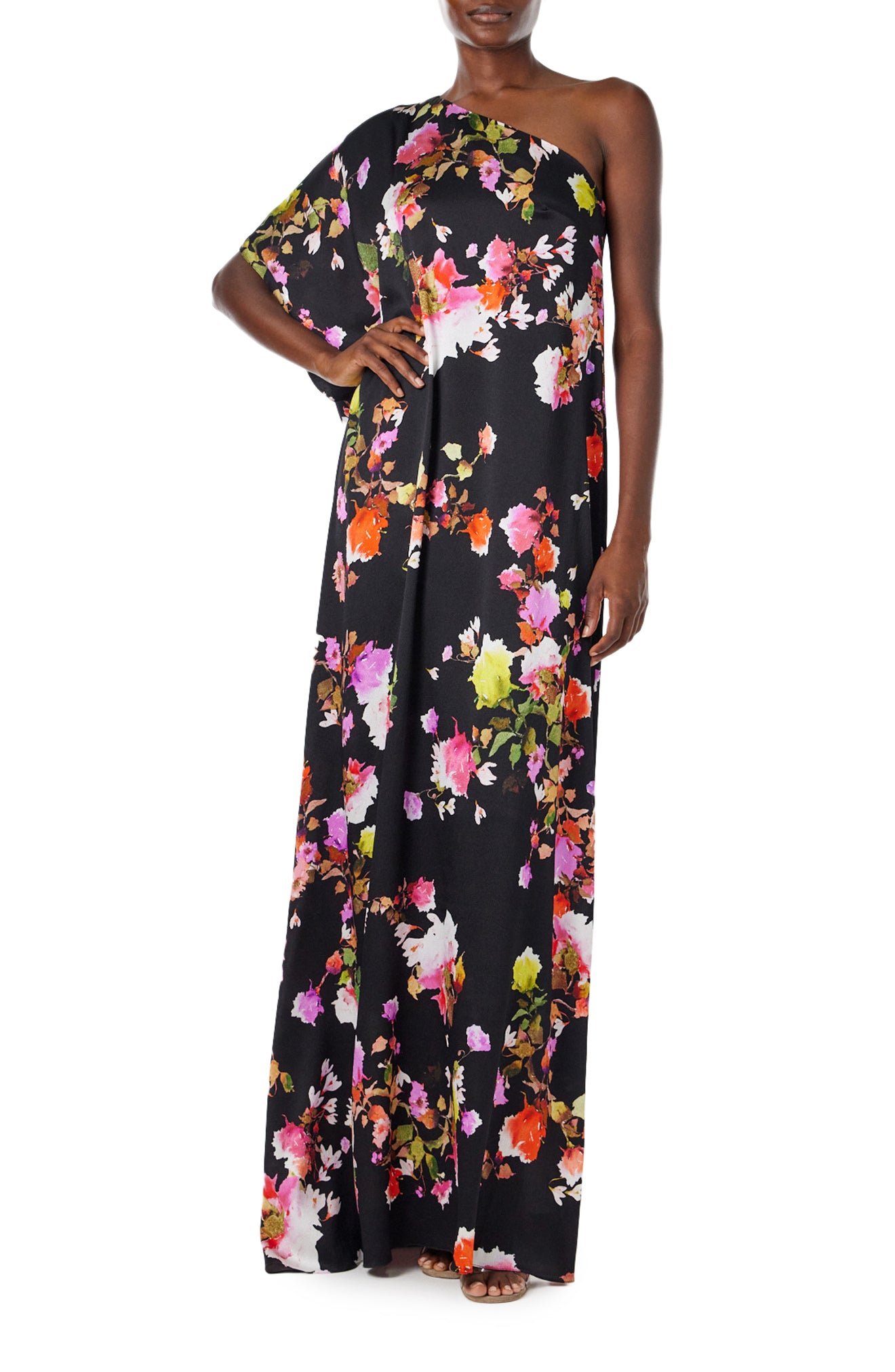 Monique Lhuillier Spring 2024 one shoulder caftan with bias flounce in noir/multi floral hammered silk - front.