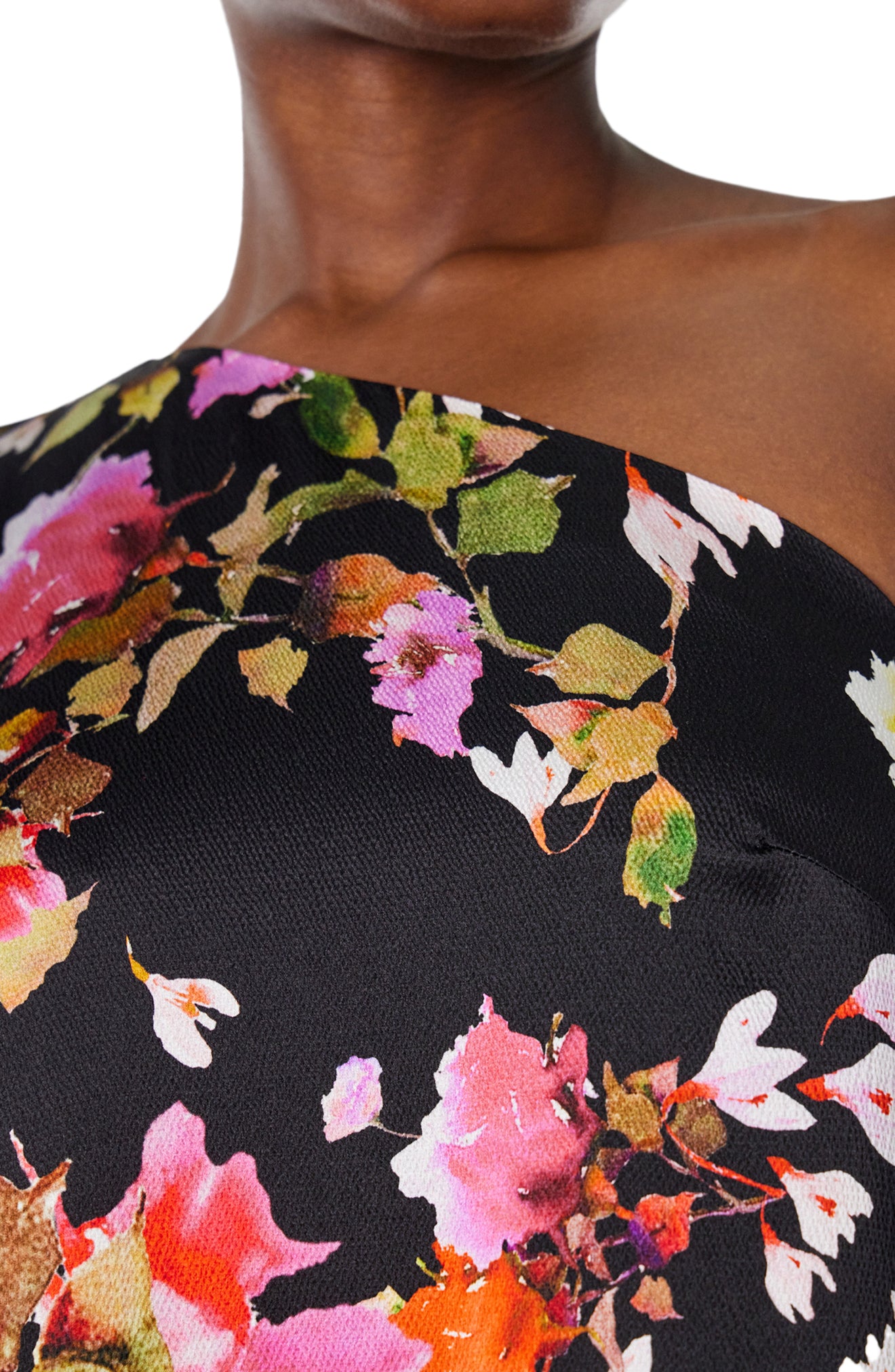 Monique Lhuillier Spring 2024 one shoulder caftan with bias flounce in noir/multi floral hammered silk - fabric detail.