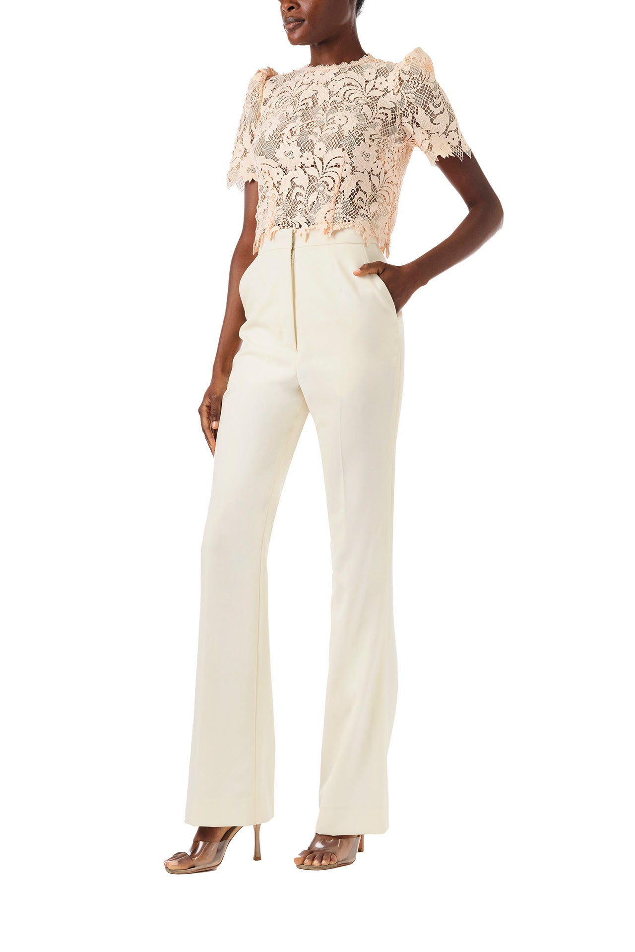 Monique Lhuillier Spring 2024 blush lace short sleeve, jewel neck lace top with sculpted shoulder and lace scallop detailing - left side.