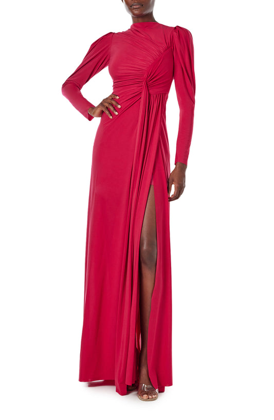 Monique Lhuillier Spring 2024 scarlet red matte jersey long sleeve, gown with draped bodice, jewel neckline and high front skirt slit - front.