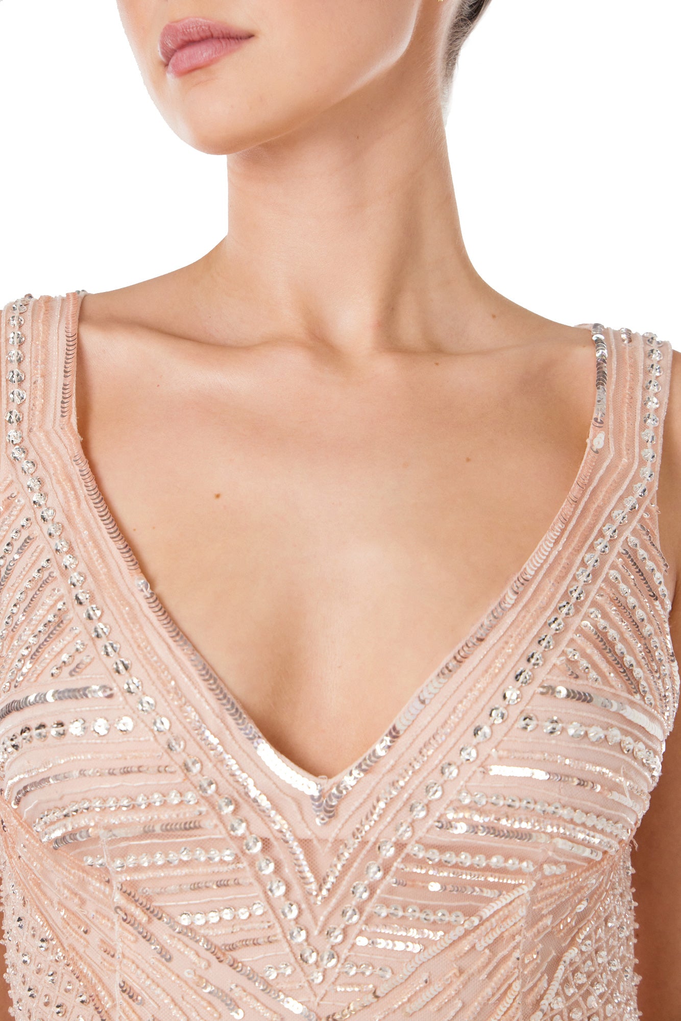 Monique Lhuillier Spring 2024 deep V-neck gown with wide straps in metallic and tonal embroidered tulle - neckline detail.