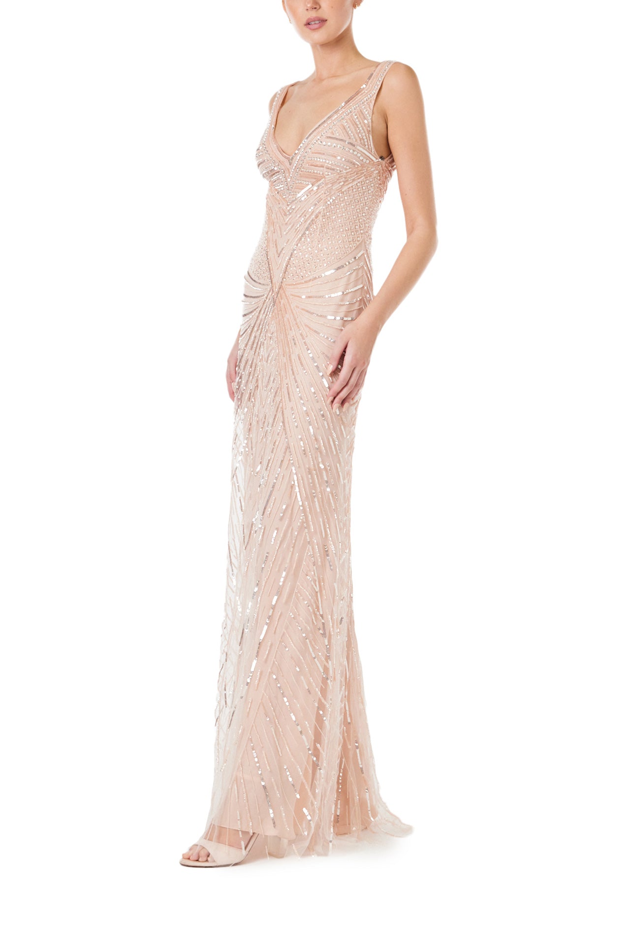 Monique Lhuillier Spring 2024 deep V-neck gown with wide straps in metallic and tonal embroidered tulle - side.