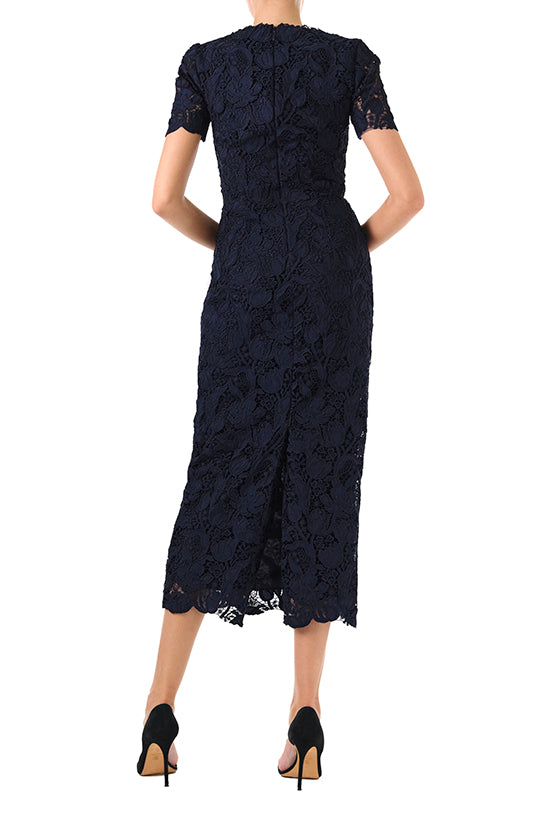 Monique Lhuillier Fall 2024 night sky colored lace sheath dress with short sleeves, scoop neckline and lace scalloped detailing - back.