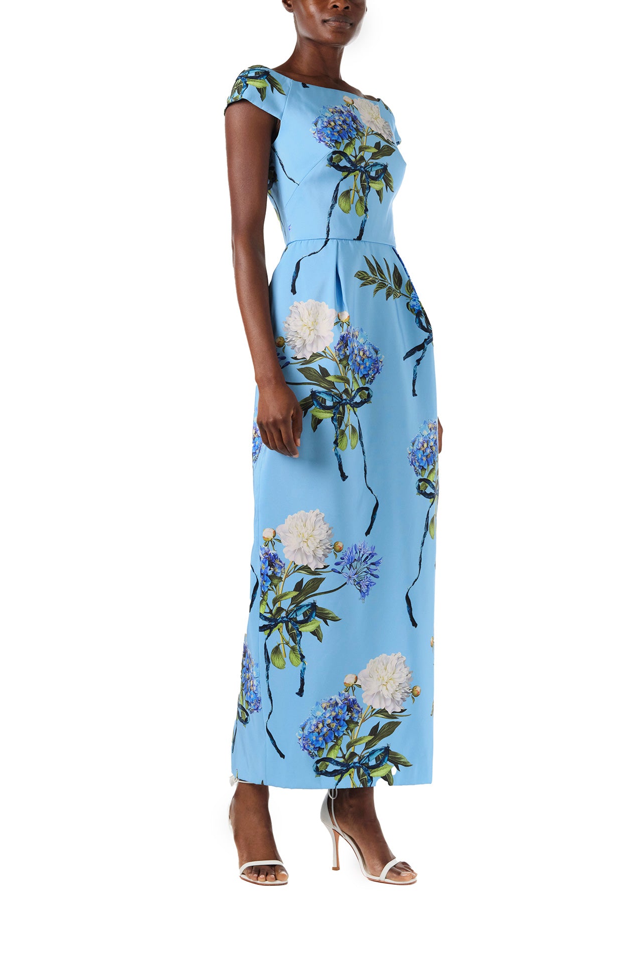 Monique Lhuillier Spring 2024 column gown with bateau neckline, cap sleeves and pockets in Sky Blue Hydrangea printed silk faille - right side.