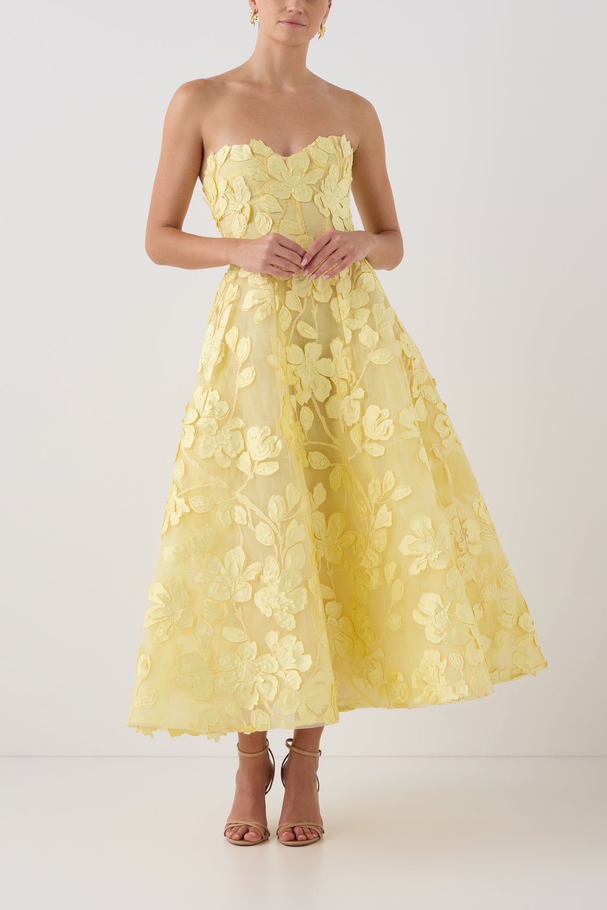 Monique Lhuillier exclusive strapless Pale Yellow tea-length dress in three-dimensional lace - front.