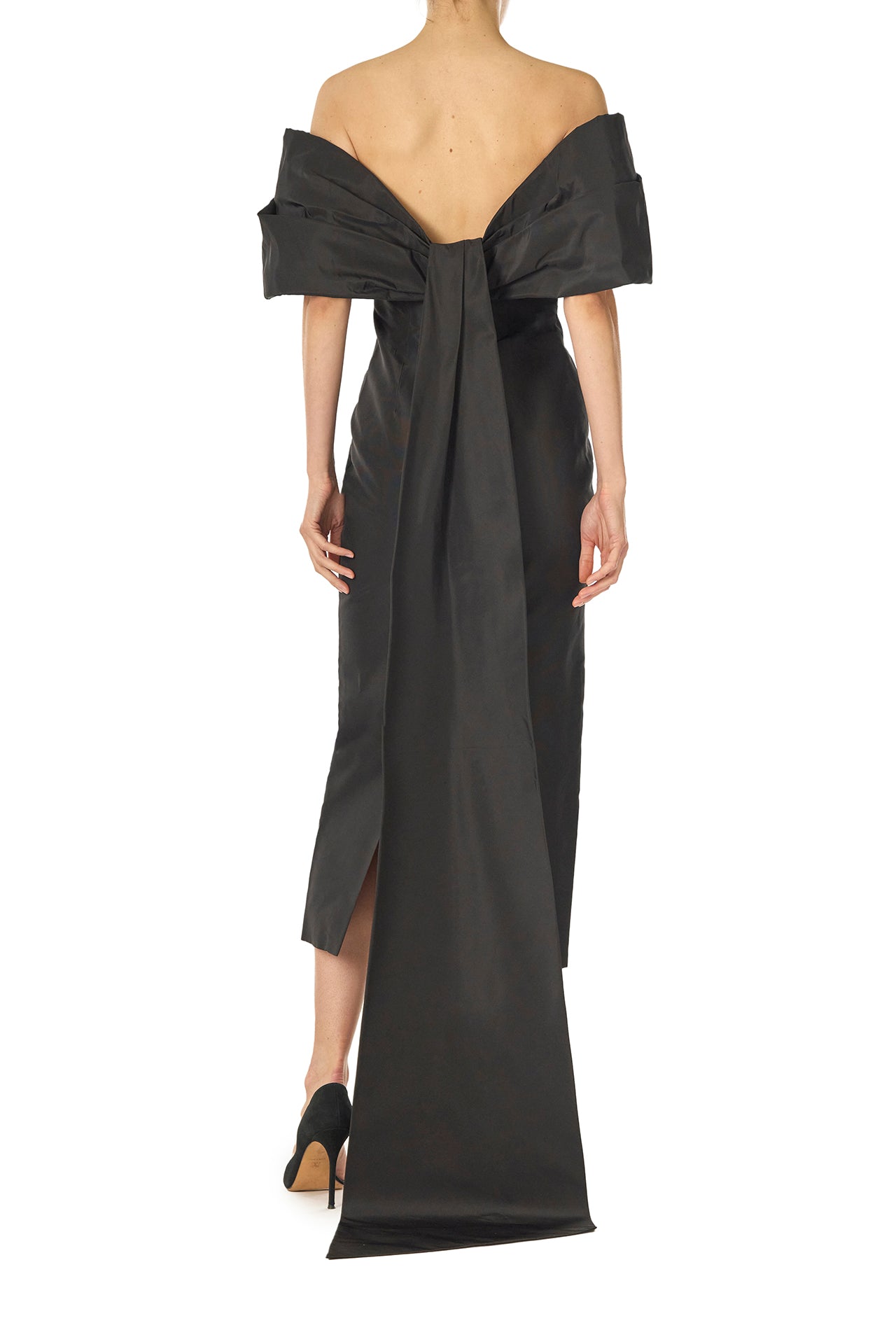 Monique Lhuillier Fall 2024 Off-the-shoulder tea length column dress with draped neckline and train in noir silk faille - back.