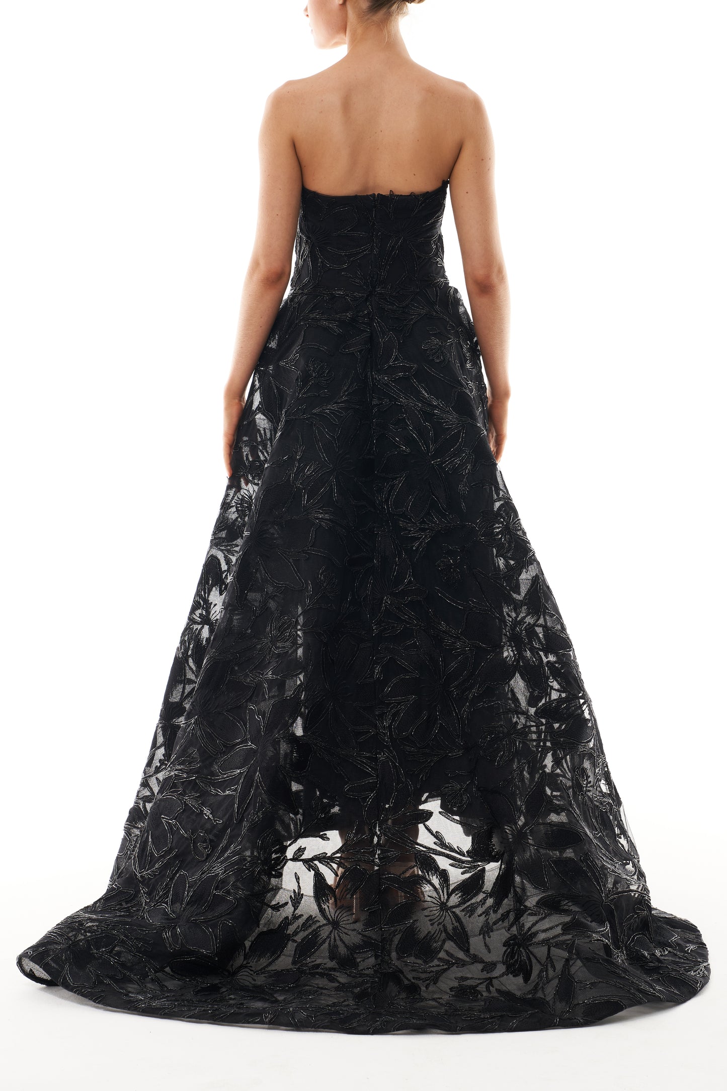 Monique Lhuillier Spring 2025 strapless gown with train in noir embroidery - back.