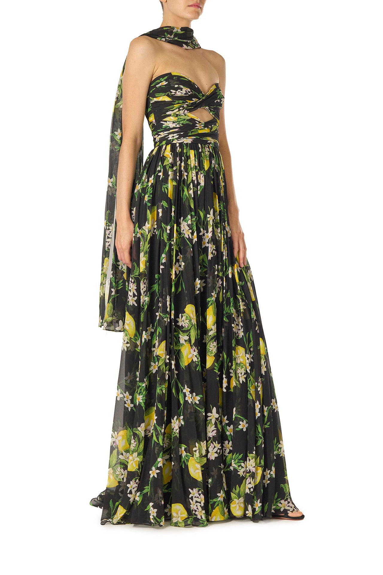 Monique Lhuillier Spring 2025 Strapless gown with draped, cut-out bodice and detached neck scarf in Floral Lemon printed Georgette fabric - side.