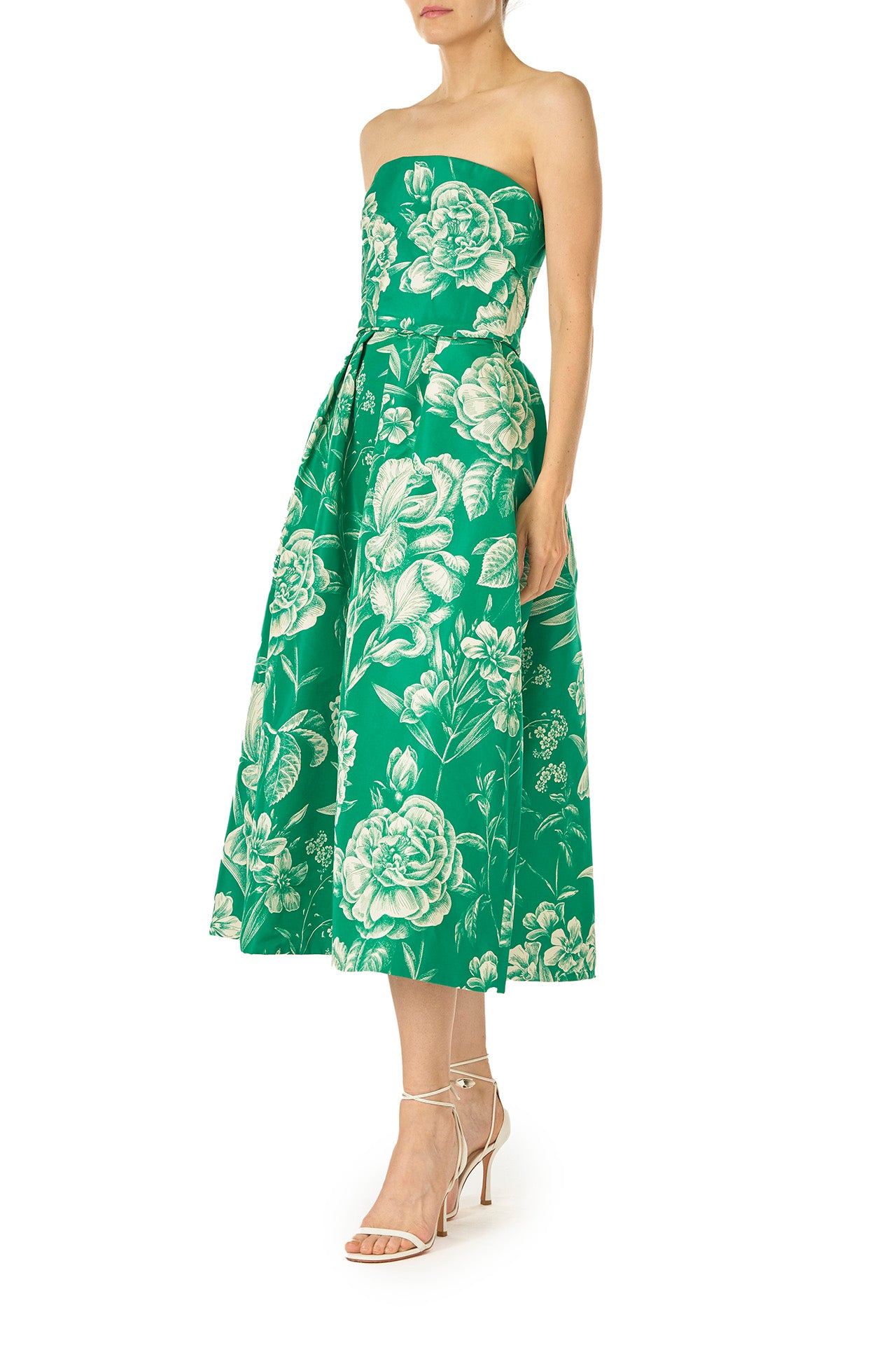 Monique Lhuillier Spring 2025 Strapless, tea-length dress with draped bodice and pockets in Grass/Silk White Floral Toile print - left side.