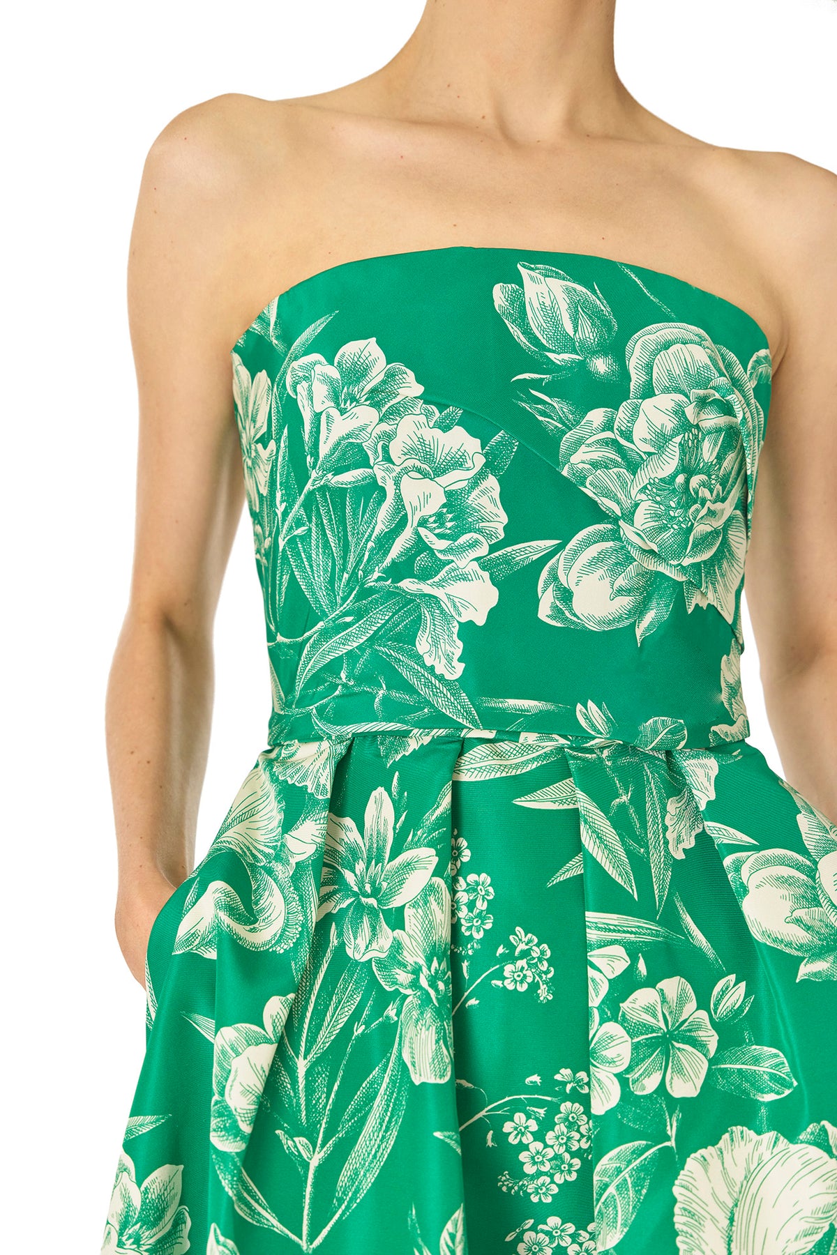 Monique Lhuillier Spring 2025 Strapless, tea-length dress with draped bodice and pockets in Grass/Silk White Floral Toile print - fabric detail.