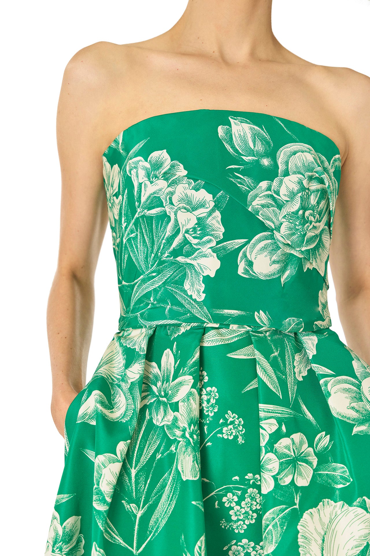 Monique Lhuillier Spring 2025 Strapless, tea-length dress with draped bodice and pockets in Grass/Silk White Floral Toile print - fabric detail.