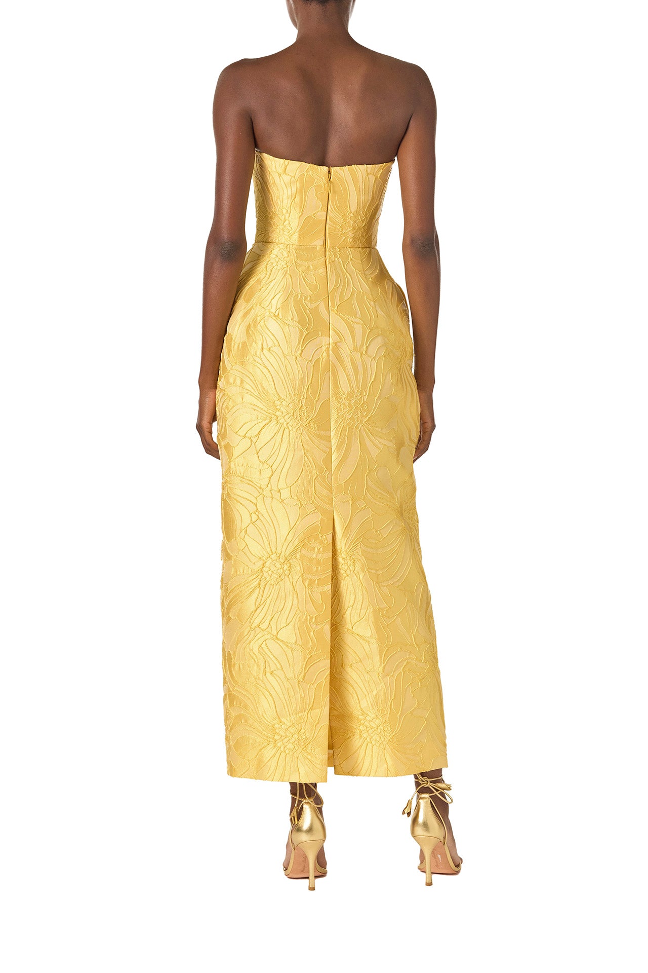 Monique Lhuillier Spring 2025 Strapless, floral jacquard cocktail dress with front pleated skirt and pockets in lemon drop color - back.