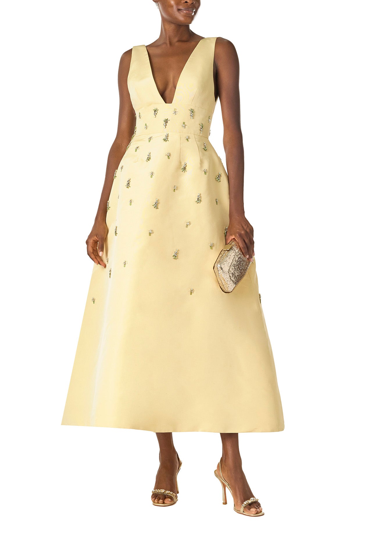 Monique Lhuillier Spring 2025 Embroidered cocktail dress with v-neckline and tea-length skirt  in Limoncello faille - front with Dasha bag.
