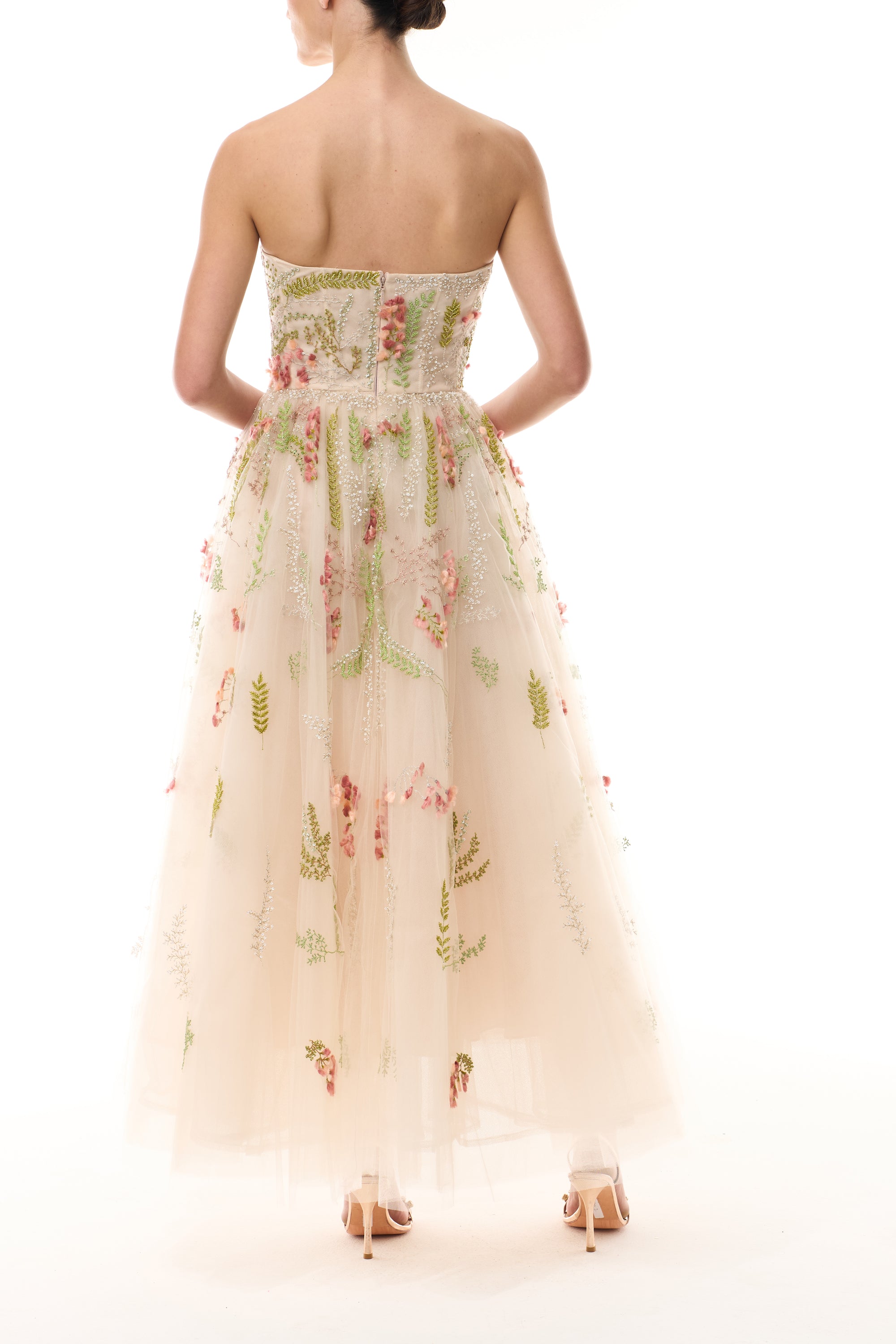Monique Lhuillier Spring 2025 strapless dress with tea length skirt in Prosecco Multi colored embroidered tulle - back.