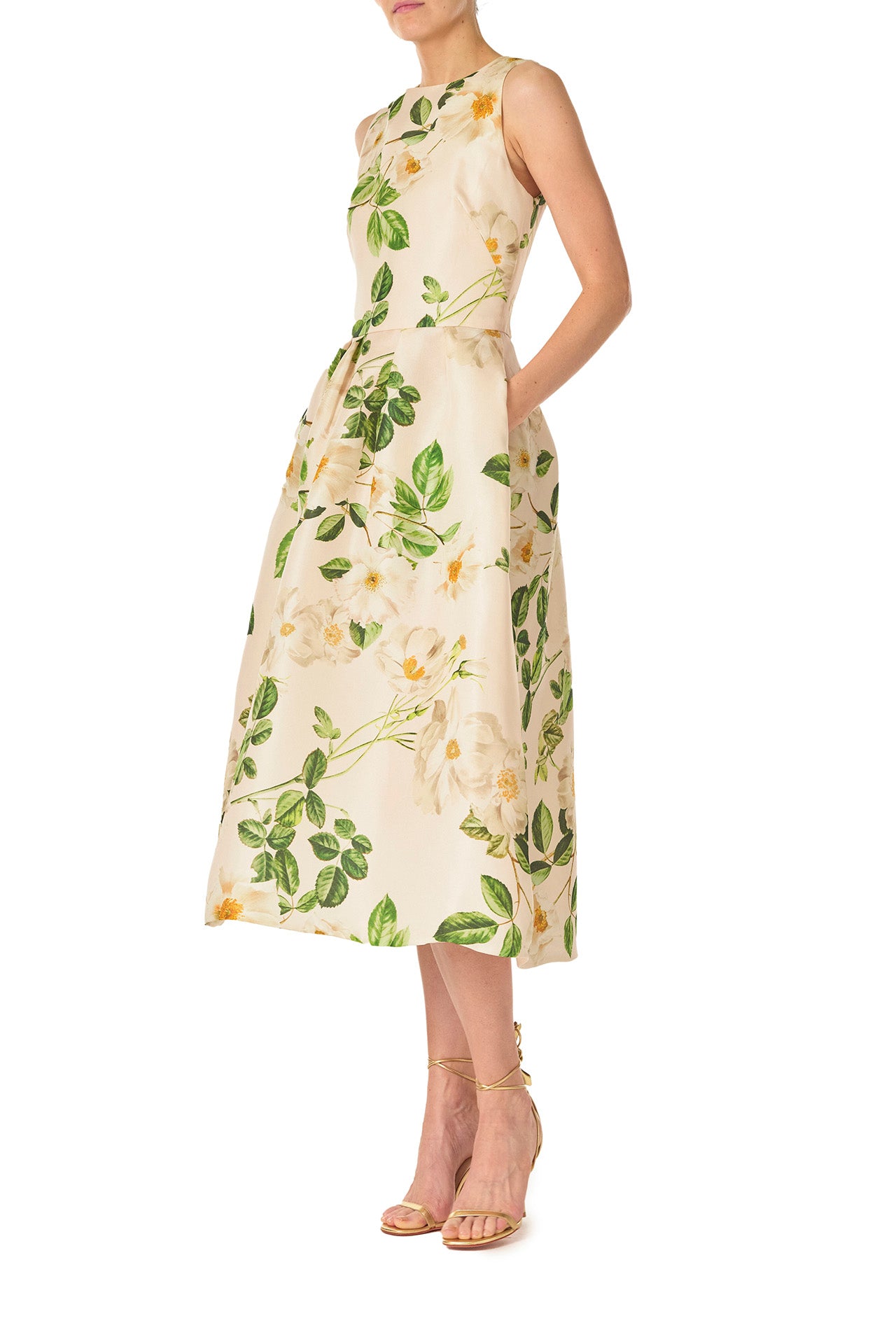 Monique Lhuillier Spring 2025 Rose print gazar sleeveless day dress with jewel neckline and pockets - left side.