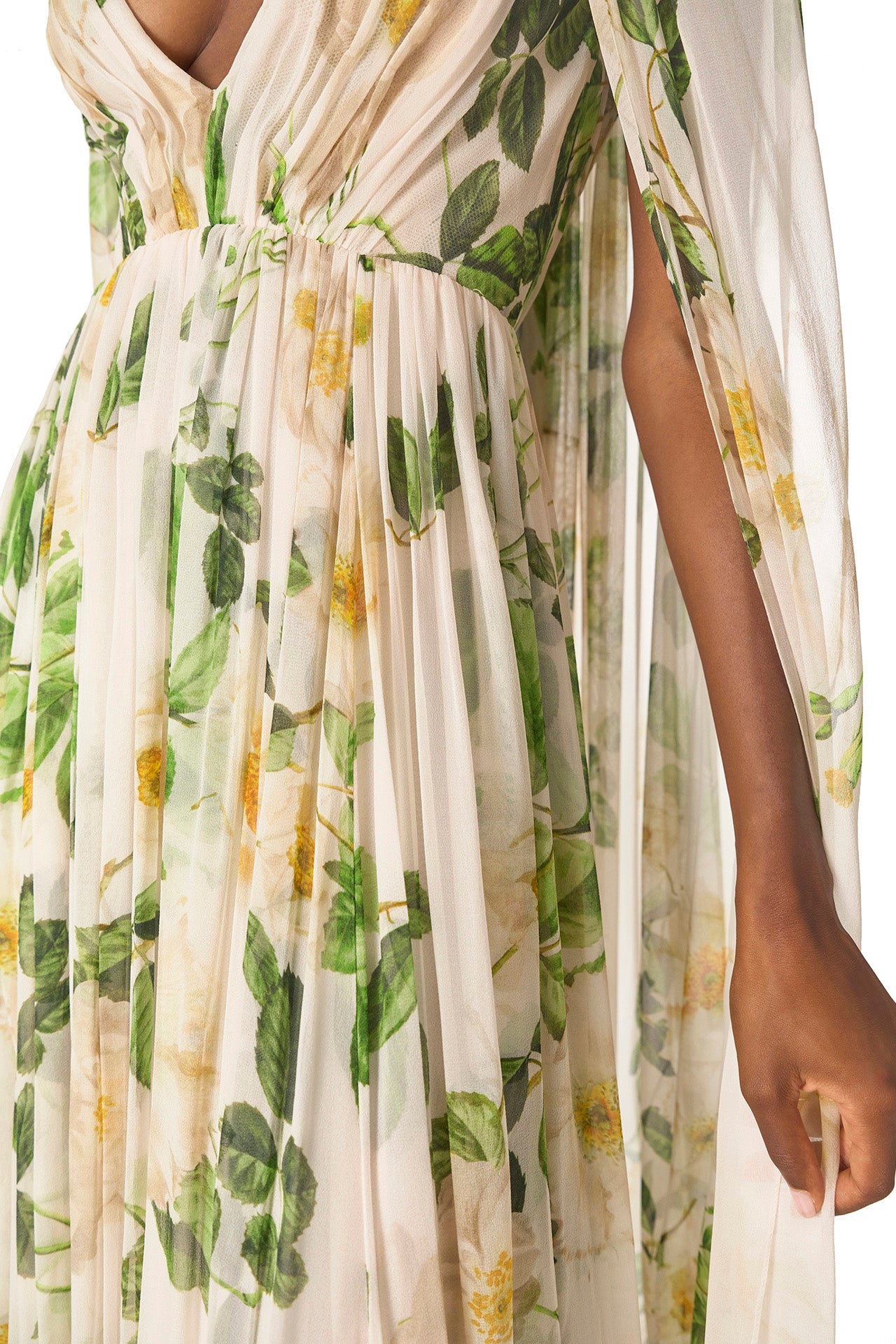 Monique Lhuillier Spring 2025 Draped, v-neck gown in Rose Printed Chiffon with low back and flowing, integral cape - fabric.