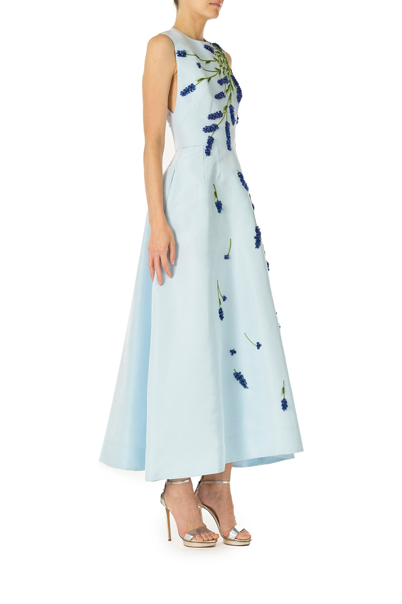 Monique Lhuillier Spring 2025 Sleeveless, tea-length dress with pockets in Powder Blue faille with Lavender-patterned embroidery - right side.