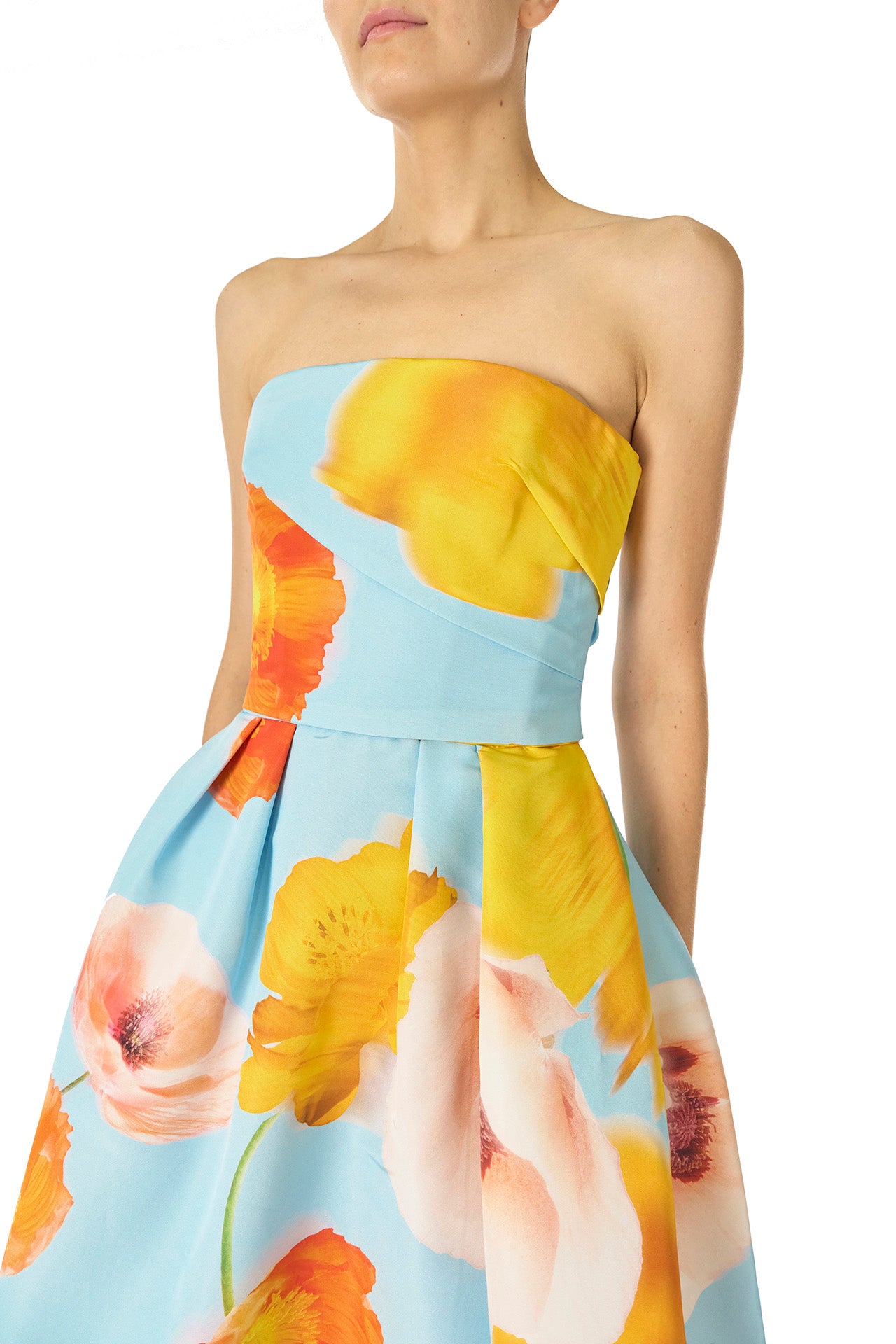 Monique Lhuillier Spring 2025 Strapless tea-length dress with draped bodice and pleated skirt in poppy printed blue faille fabric - bodice.