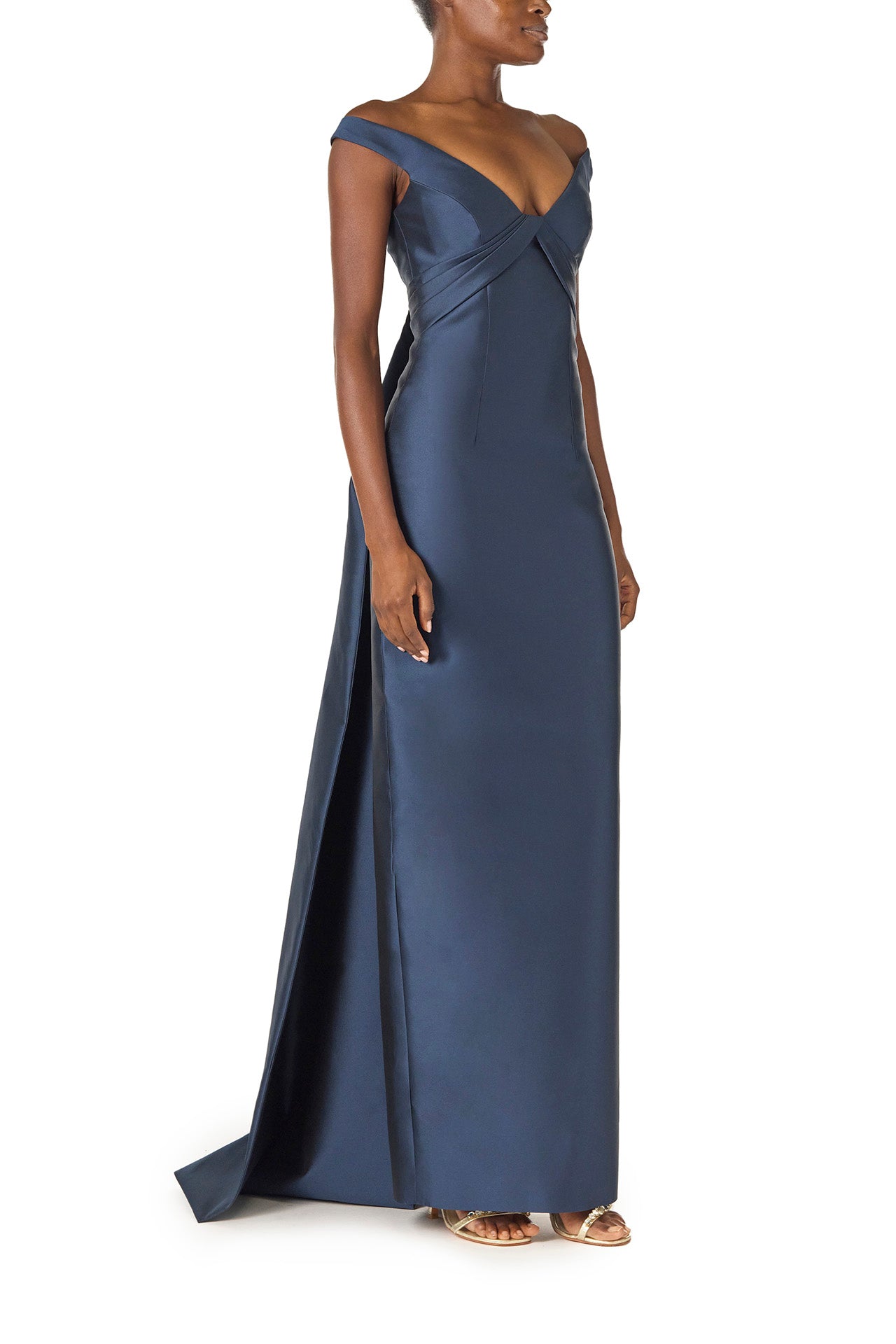 Monique Lhuillier Spring 2025 Off the shoulder gown with draped, low cut V-neckline and with integral draped ties down the back in Lapis Mikado - right side.