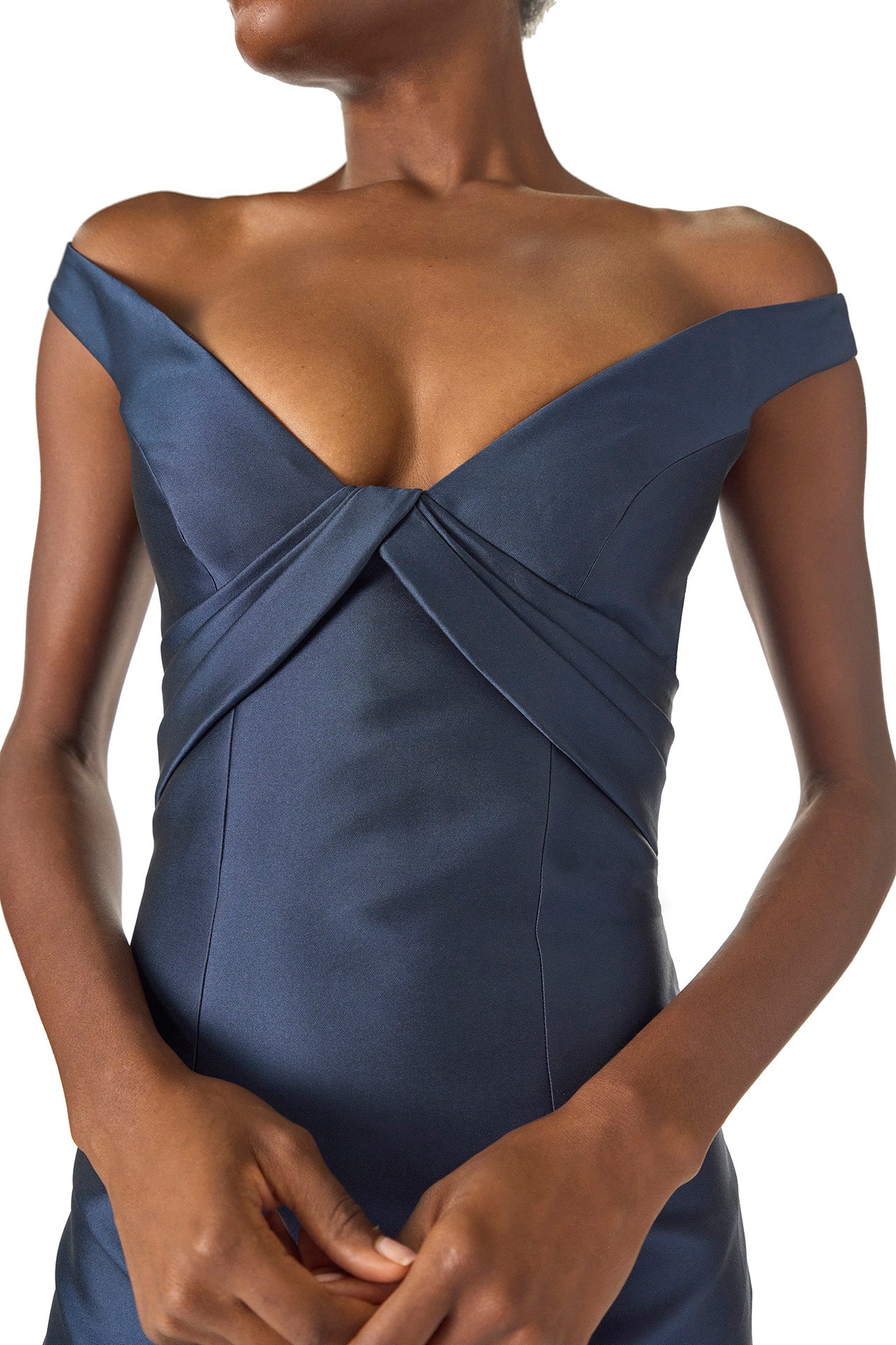 Monique Lhuillier Spring 2025 Off the shoulder gown with draped, low cut V-neckline and with integral draped ties down the back in Lapis Mikado - neckline.