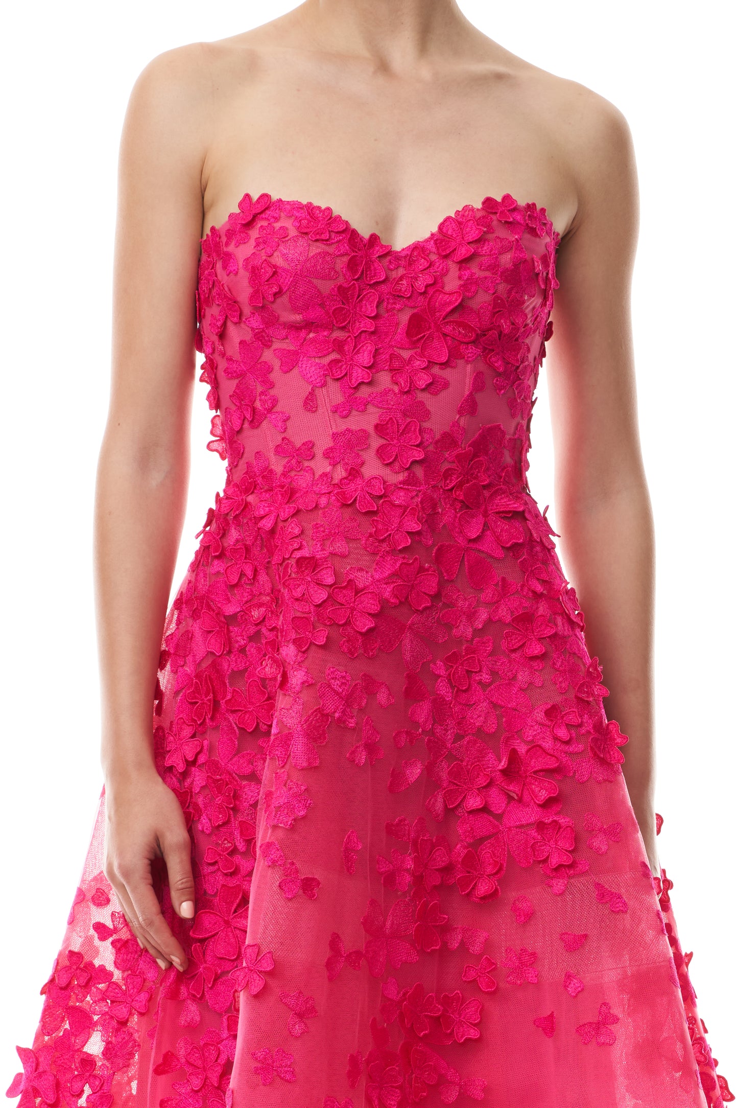 Monique Lhuillier Fall 2026 strapless, tea-length dress with sweetheart neckline in Cerise colored embroidered lace - fabric.