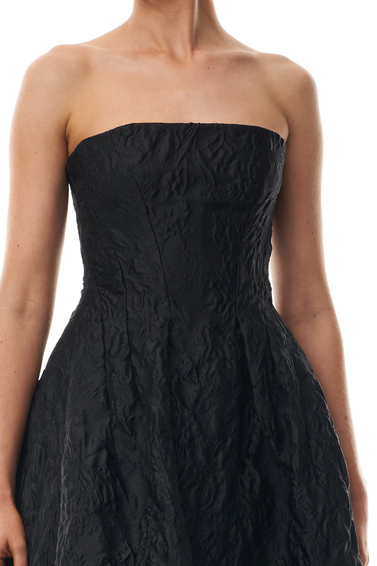 Monique Lhuillier Fall 2025 strapless midi-length dress with pockets in noir floral jacquard - fabric.