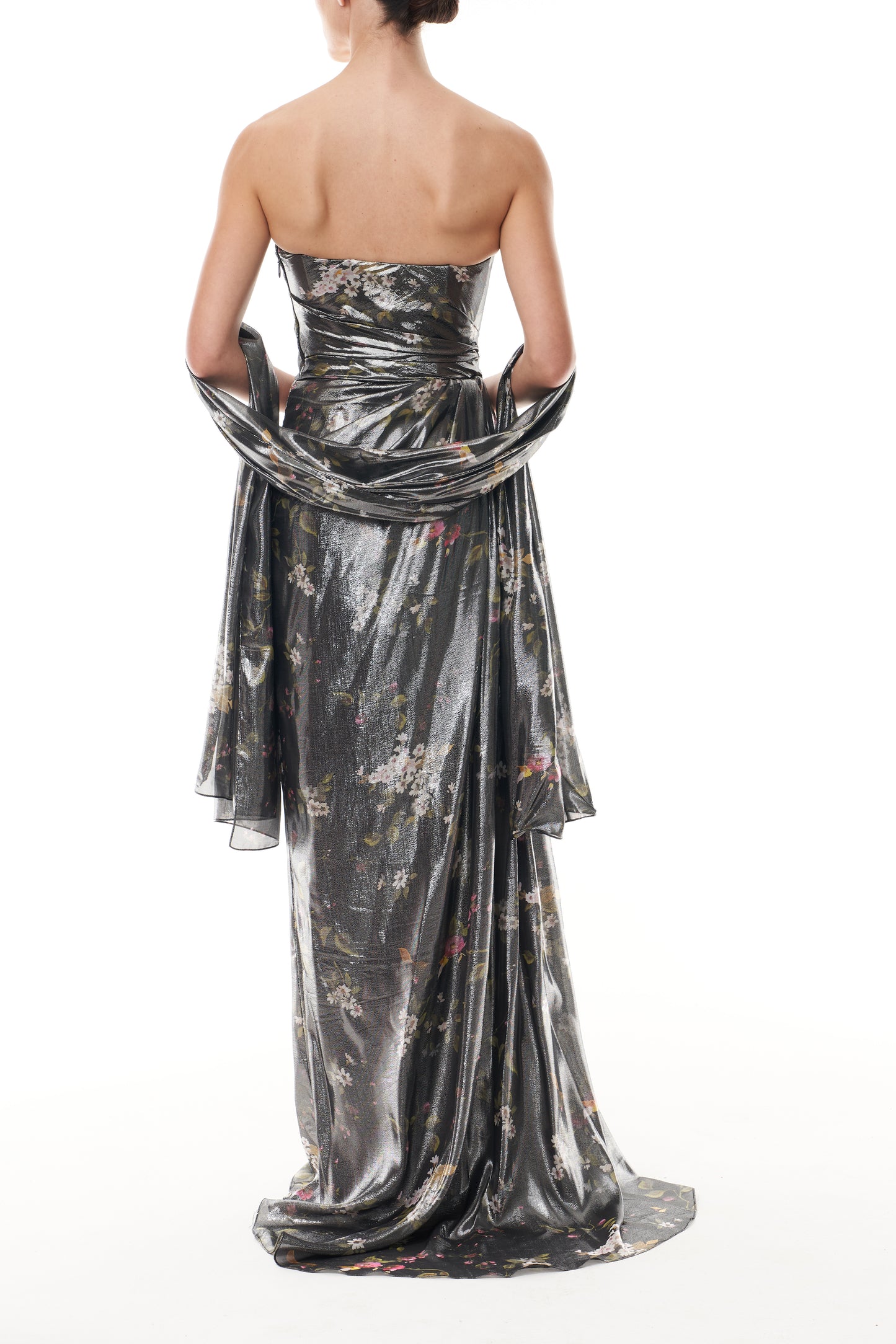 Monique Lhuillier Fall 2025 strapless gown with detached neck scarf in metallic floral printed lame fabric - back.