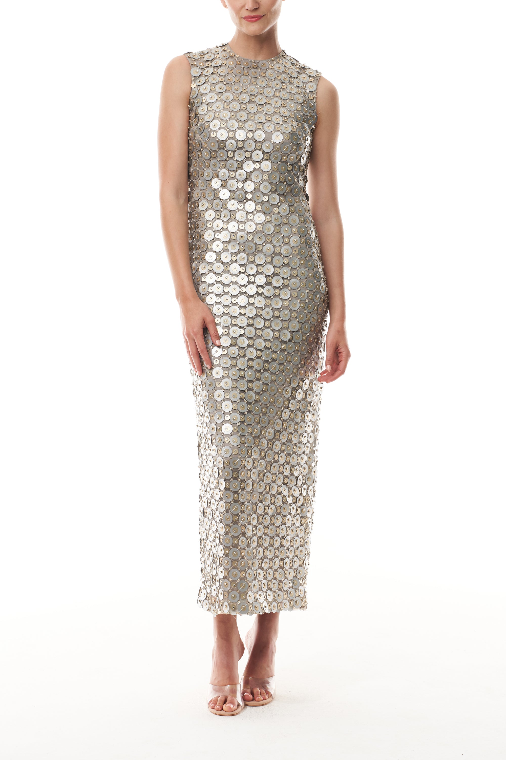 Monique Lhuillier Fall 2025 Sleeveless, tea-length shift dress in silver & gold disc embroidery - front.