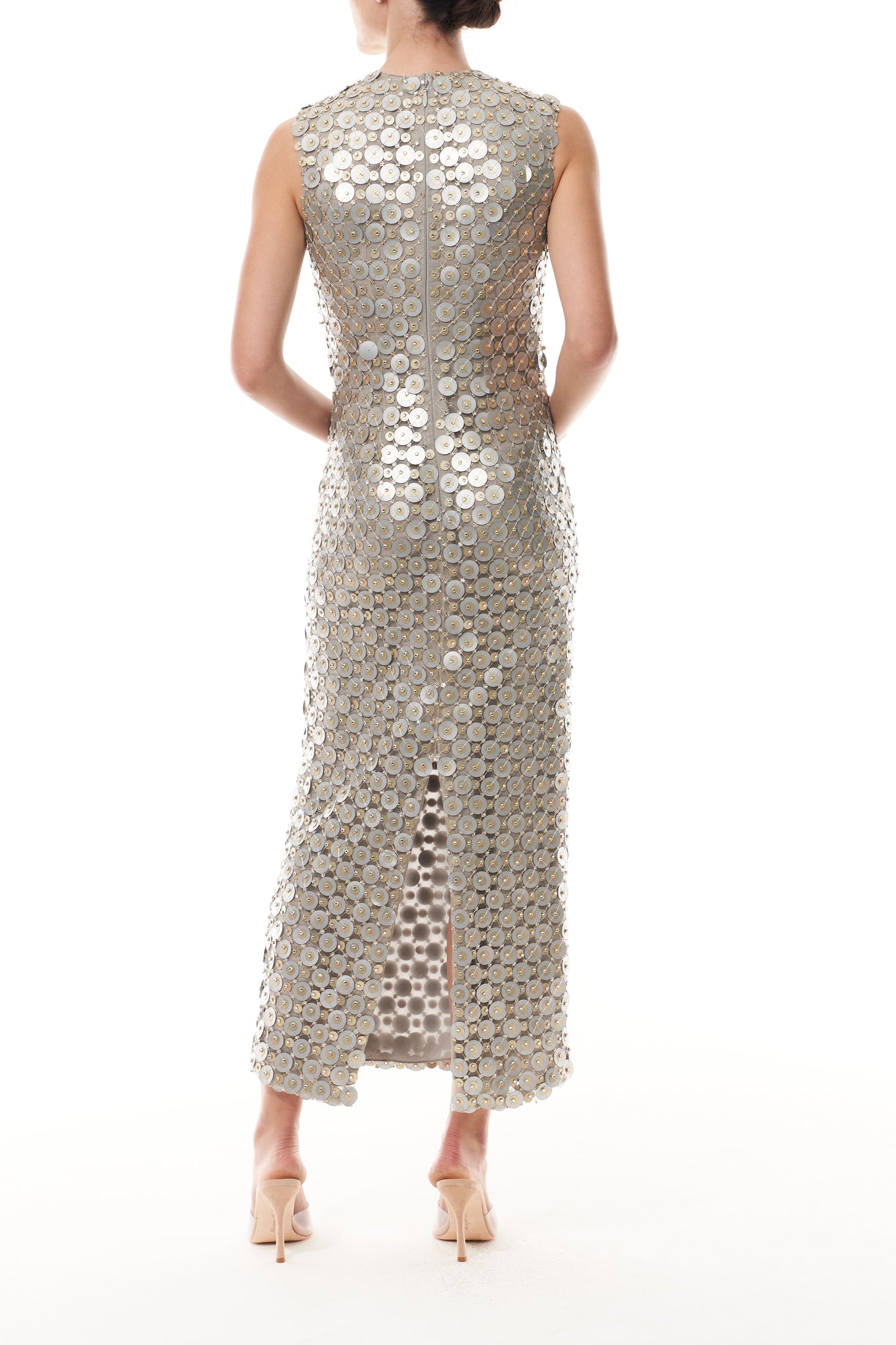Monique Lhuillier Fall 2025 Sleeveless, tea-length shift dress in silver & gold disc embroidery - back.