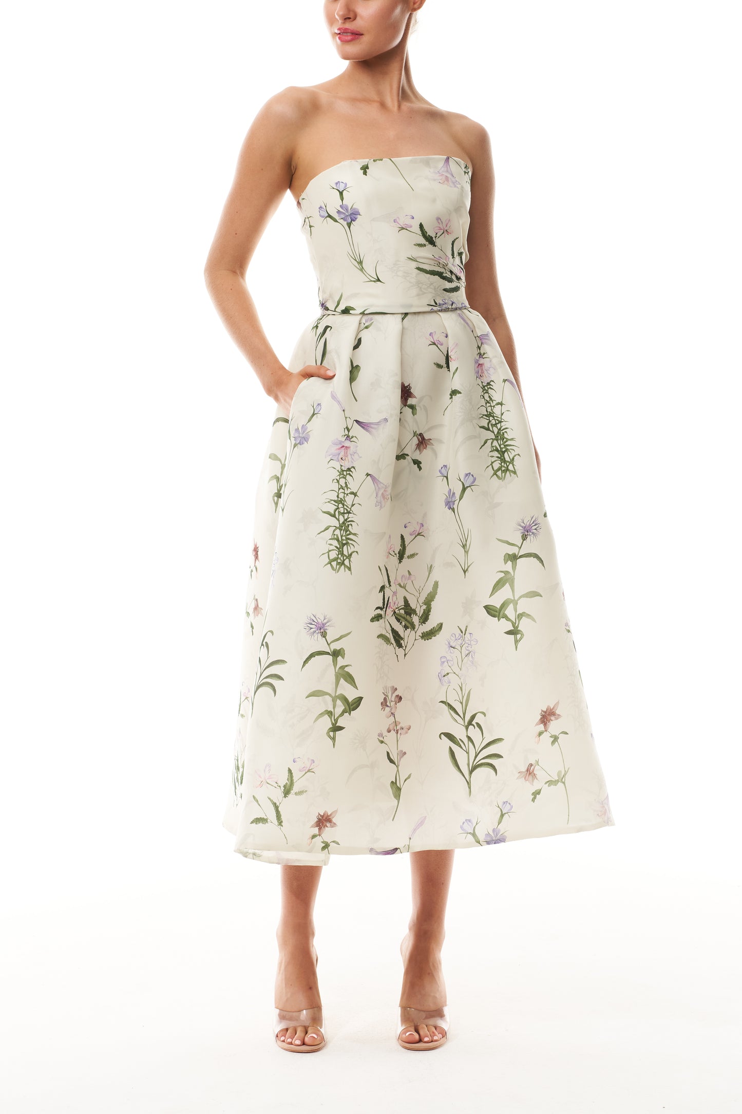 Monique Lhuillier Fall 2025 strapless dress with pleated waistline in floral printed gazar fabric - front.