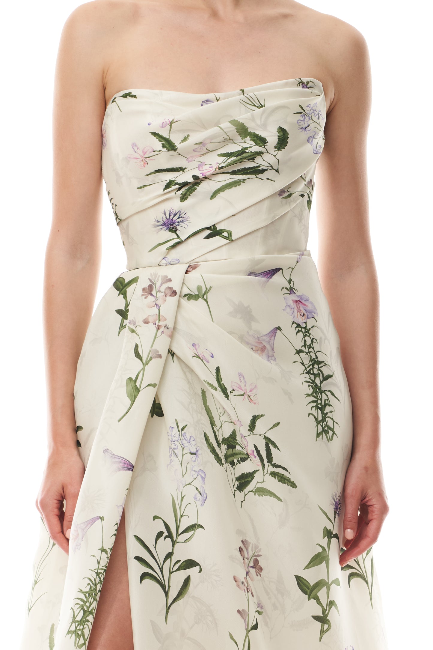 Monique Lhuillier Fall 2025 strapless, floor length gown with draped bodice and high leg slit in ivory floral multi printed gazar fabric - bodice.