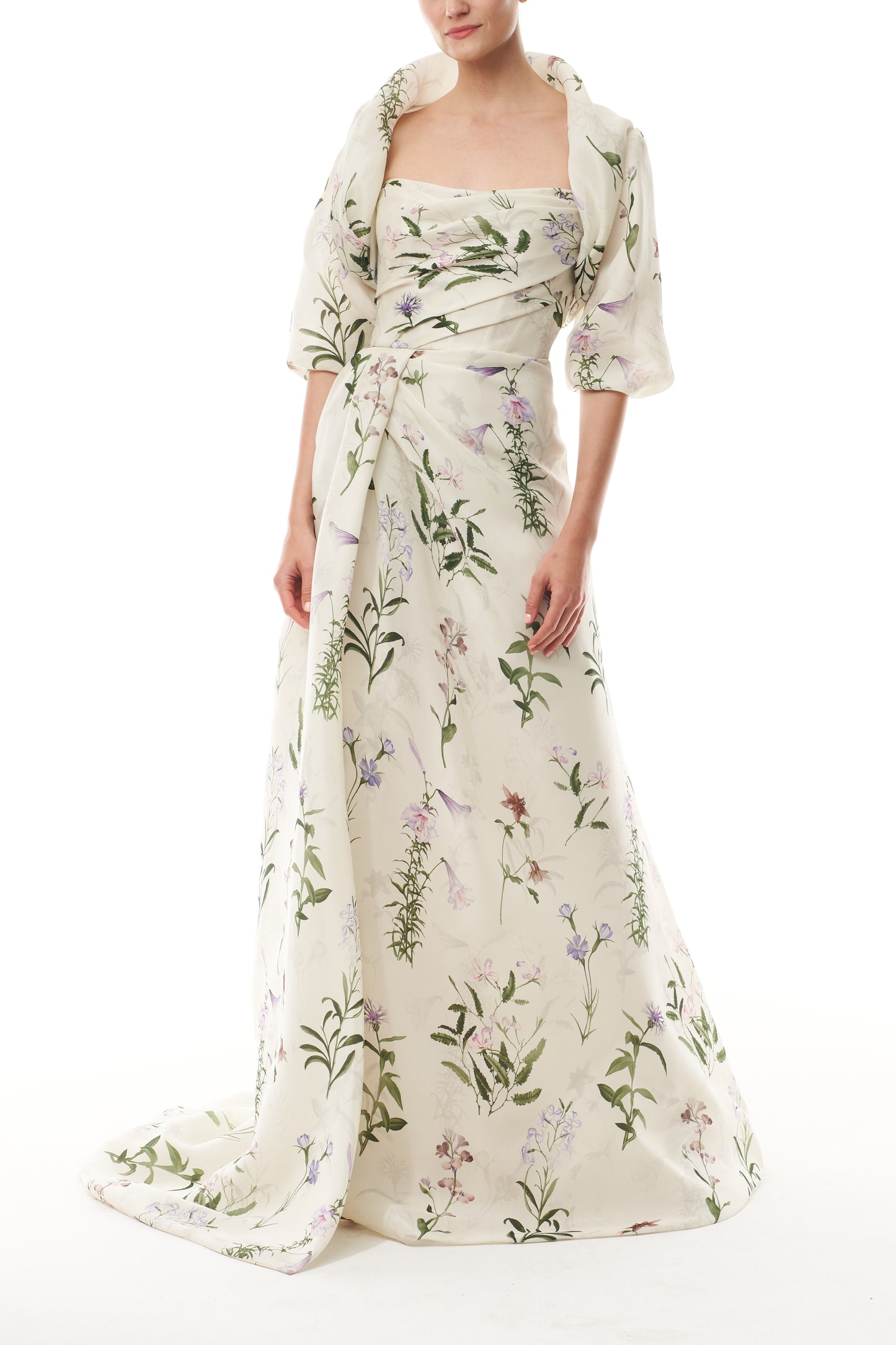 Monique Lhuillier Fall 2025 high neck bolero in floral gazar shown over the matching strapless gown - front.