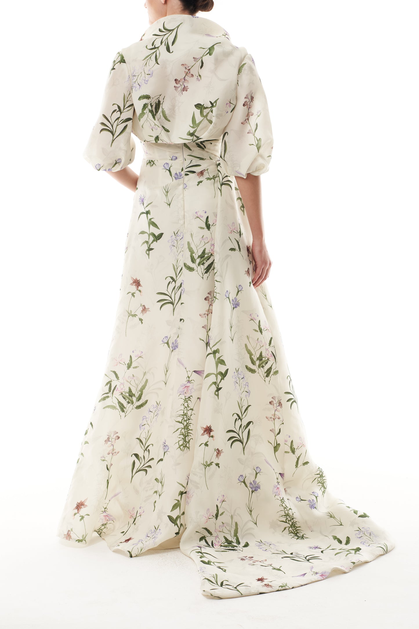 Monique Lhuillier Fall 2025 high neck bolero in floral gazar shown over the matching strapless gown - back.