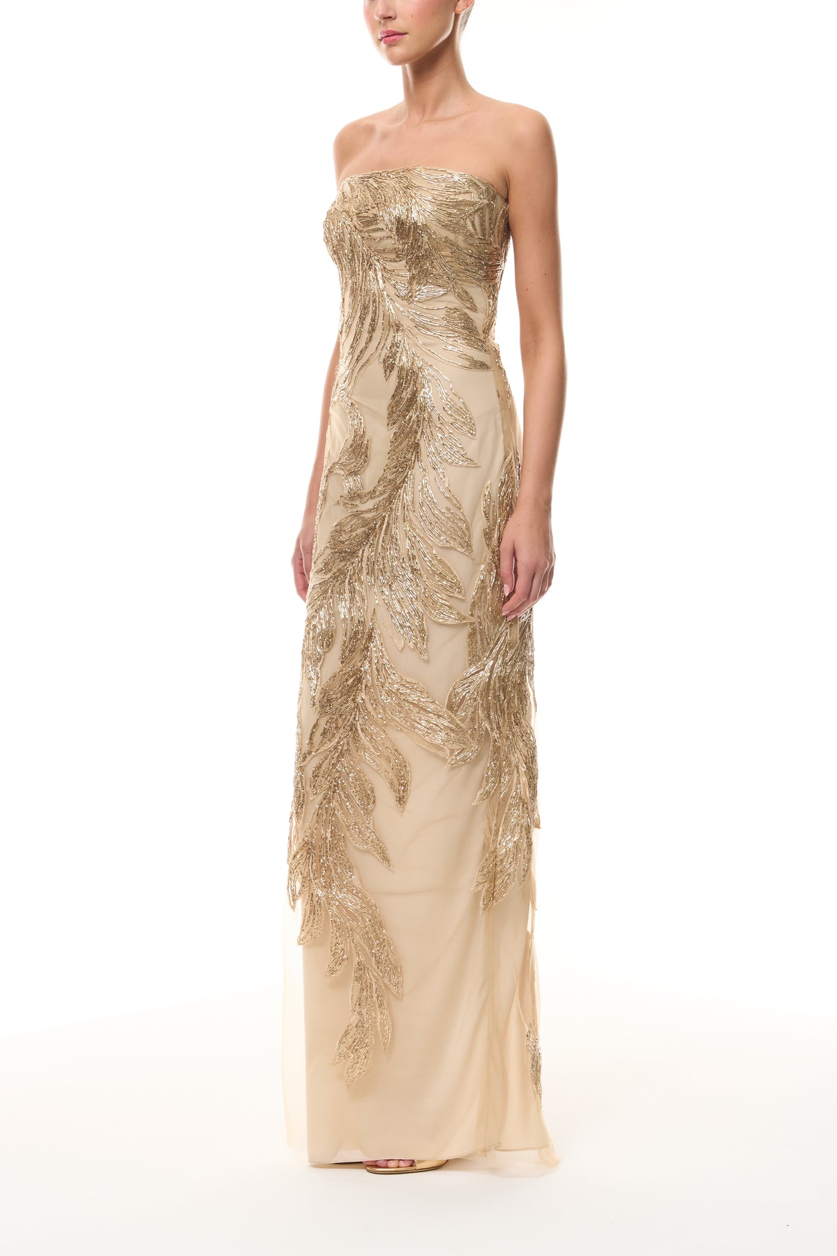 Monique Lhuillier Fall 2025 Gold feather embroidered tulle strapless column gown - side.