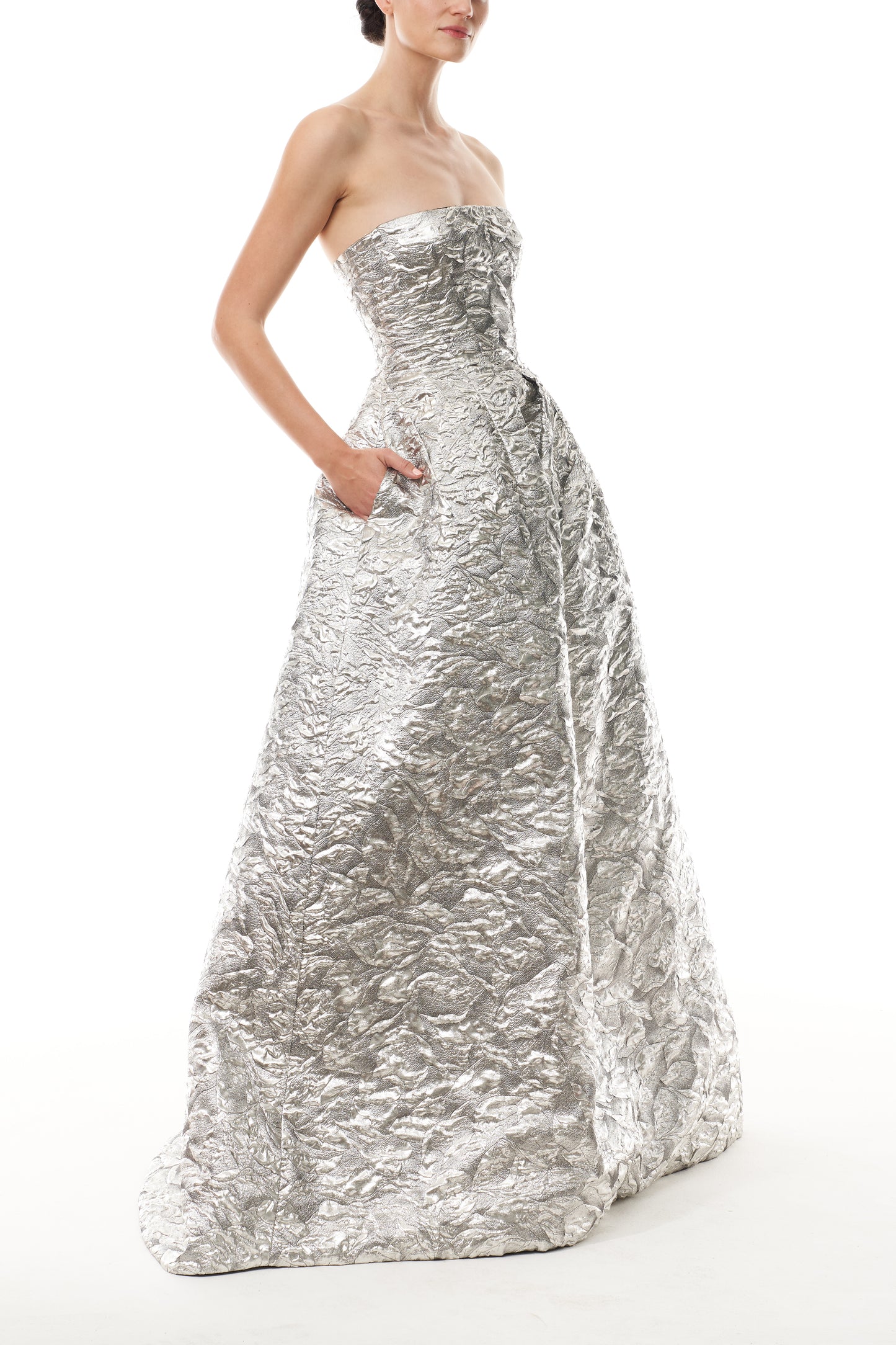 Monique Lhuillier Fall 2025 strapless ballgown in silver metallic jacquard - side.